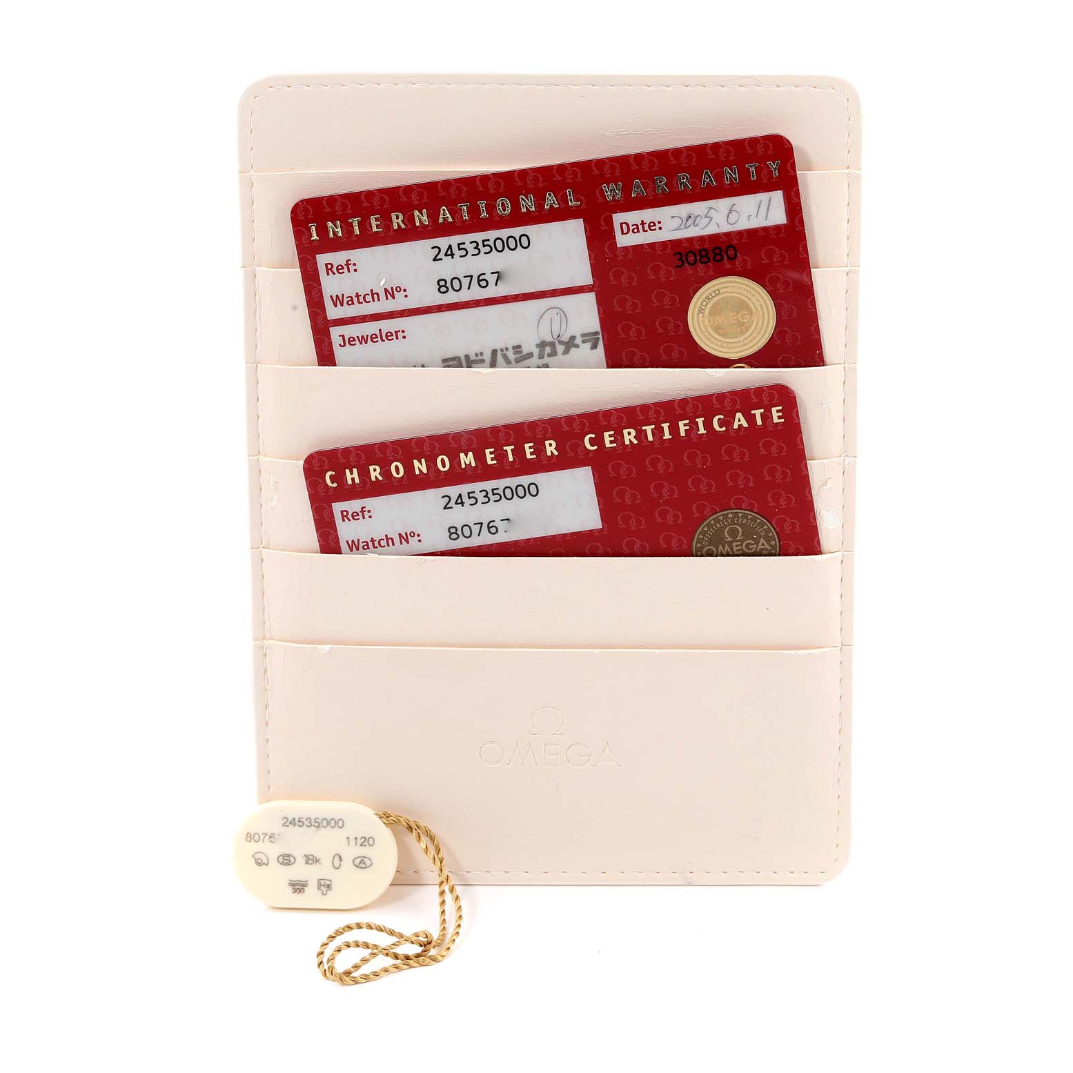 The image shows the Omega Seamaster 2453.50.00 Men's Steel and Gold (two tone) Black Dial 2453.50.00 Men's Steel and Gold (two tone) Black Dial's warranty cards and Chronometer certificate in a holder, along with the tag.