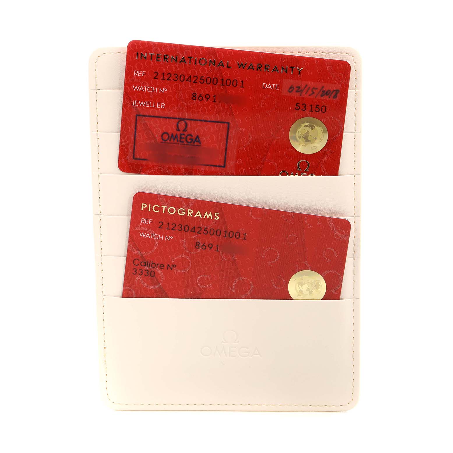 The image shows international warranty and pictograms cards for an Omega Seamaster 212.30.42.50.01.001 Men's Stainless Steel Black Dial, placed in a white Omega card holder.