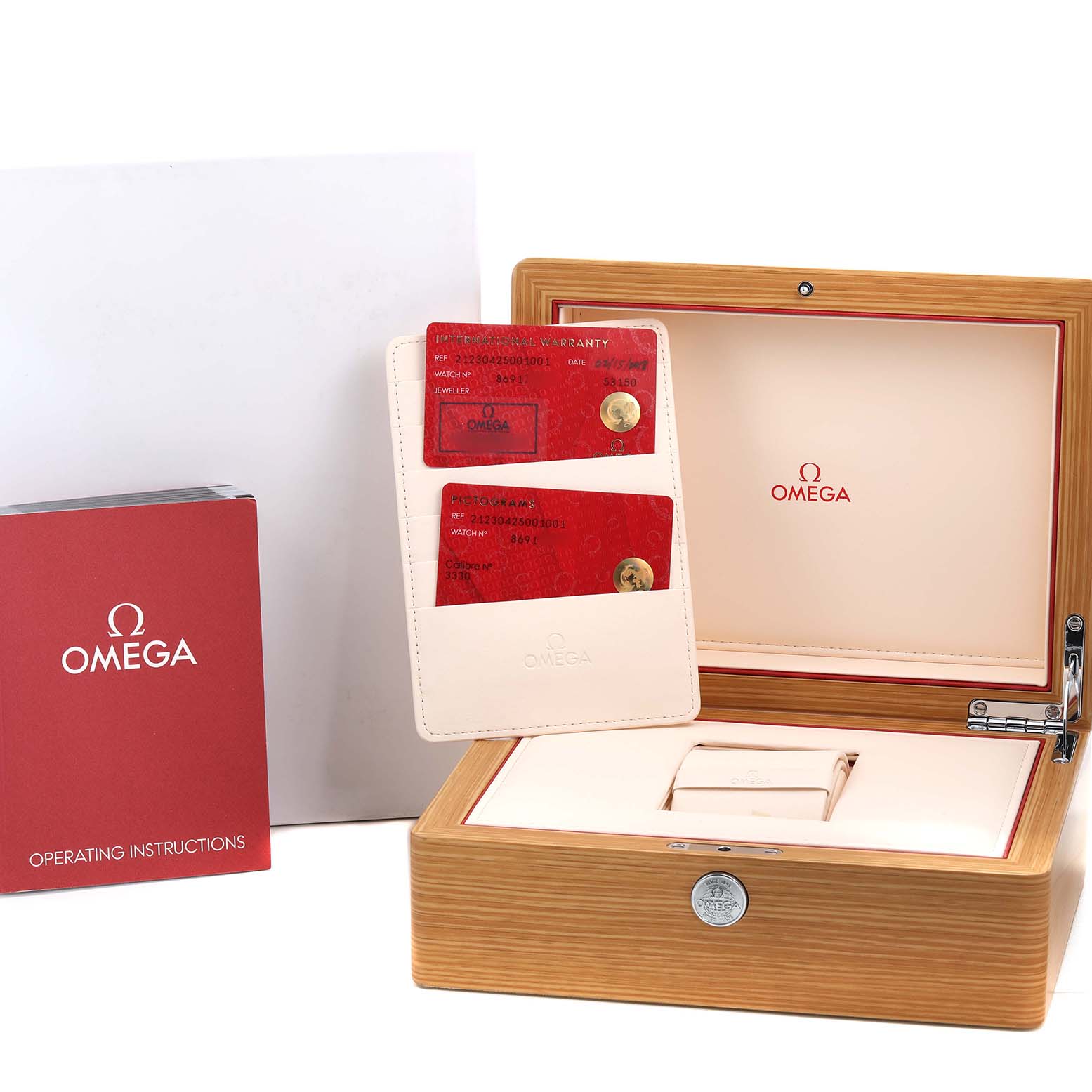 The image shows an Omega Seamaster 212.30.42.50.01.001 Men's Stainless Steel Black Dial accessory set with a wooden box, warranty cards, and operating instructions.