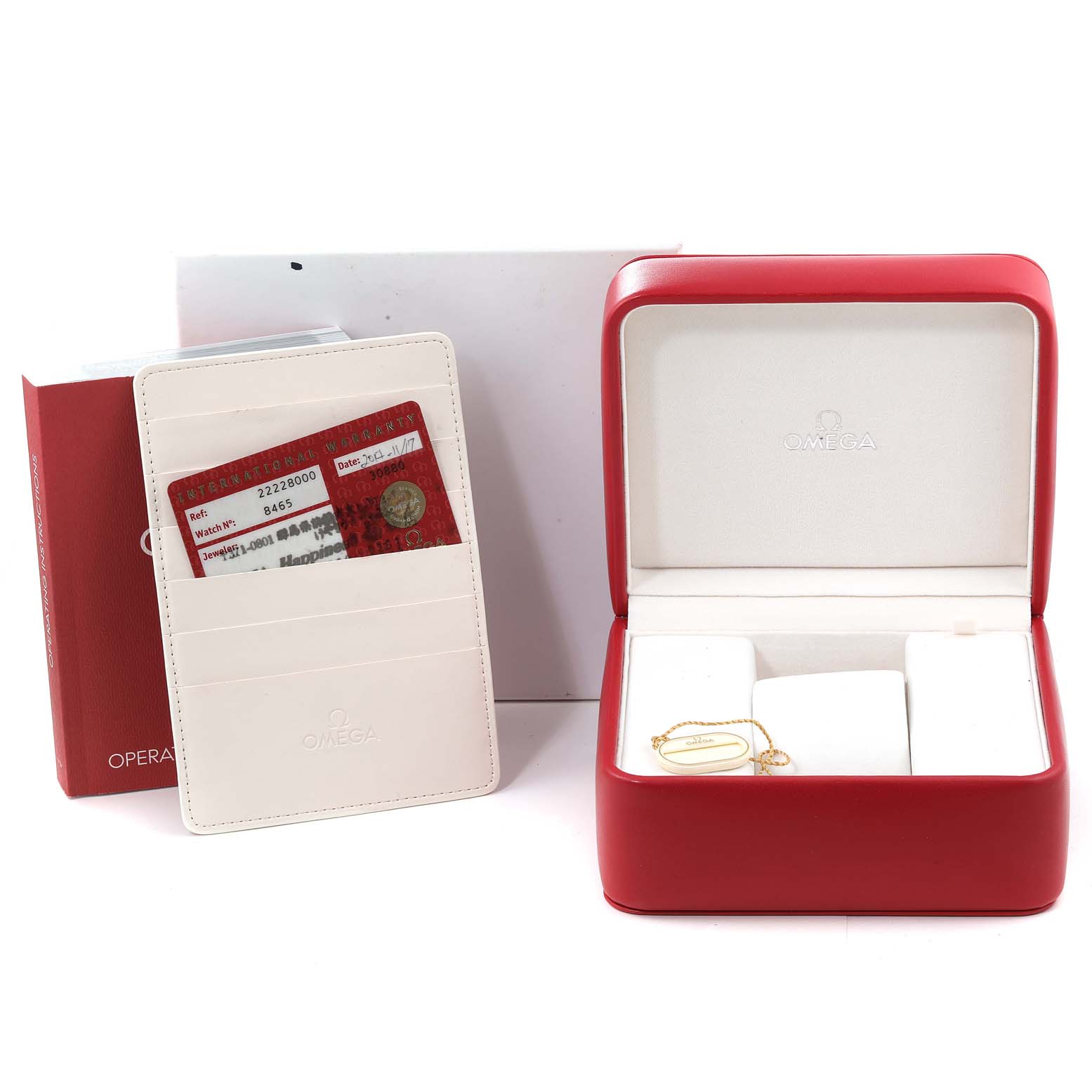 The image shows a red Omega Seamaster 2222.80.00 Men's Stainless Steel Blue Dial 2222.80.00 Men's Stainless Steel Blue Dial watch box, a white cardholder with cards, and an operating manual, all from a front angle.