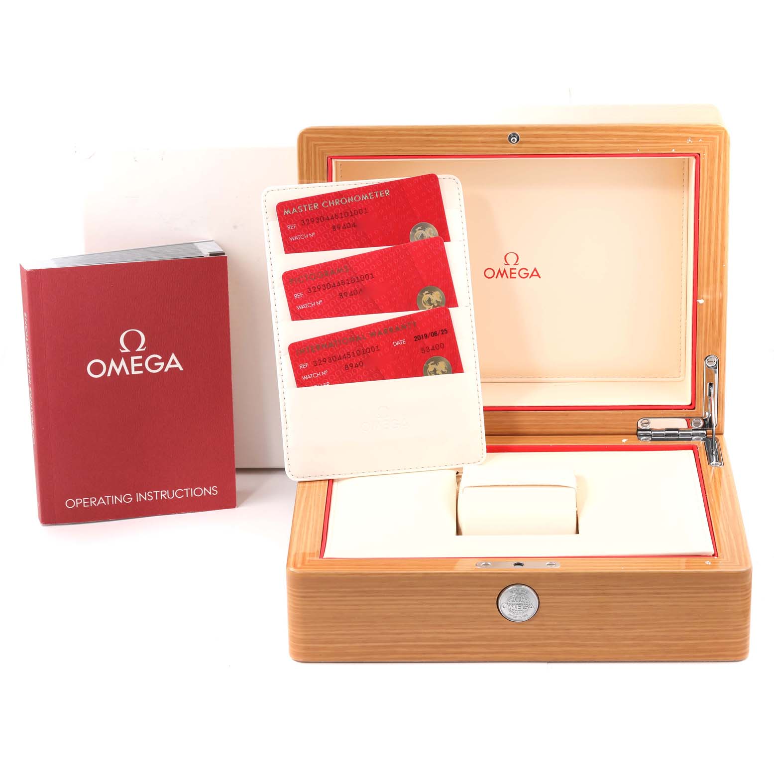 The image shows the Omega Speedmaster 329.30.44.51.01.001 Men's Stainless Steel Black Dial 329.30.44.51.01.001 Men's Stainless Steel Black Dial watch box, operating instructions, and certification cards, taken from a front angle.