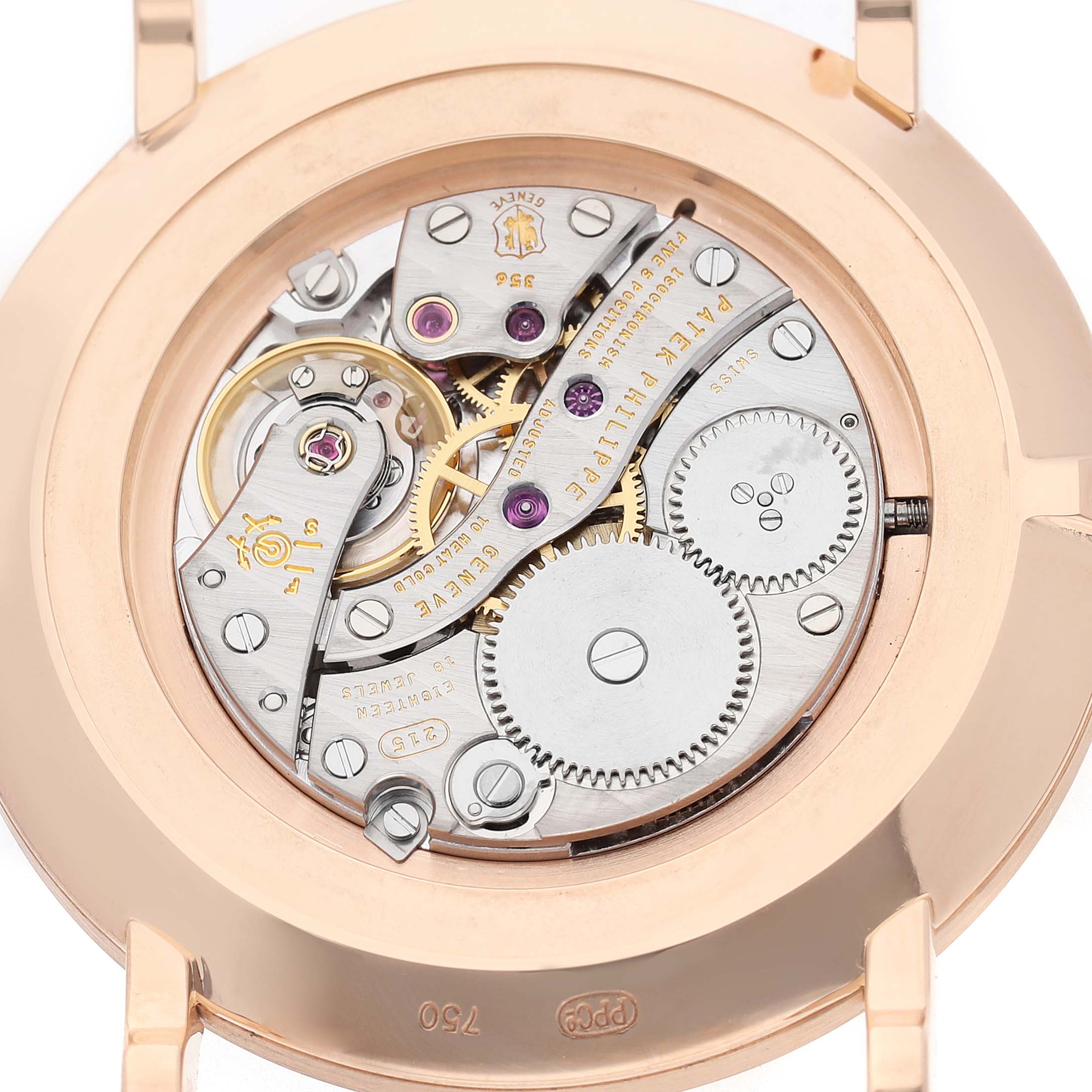 The image shows the case back of the Patek Philippe Calatrava 5119 5119R Men's Rose Gold White Dial, highlighting its intricate mechanical movement.