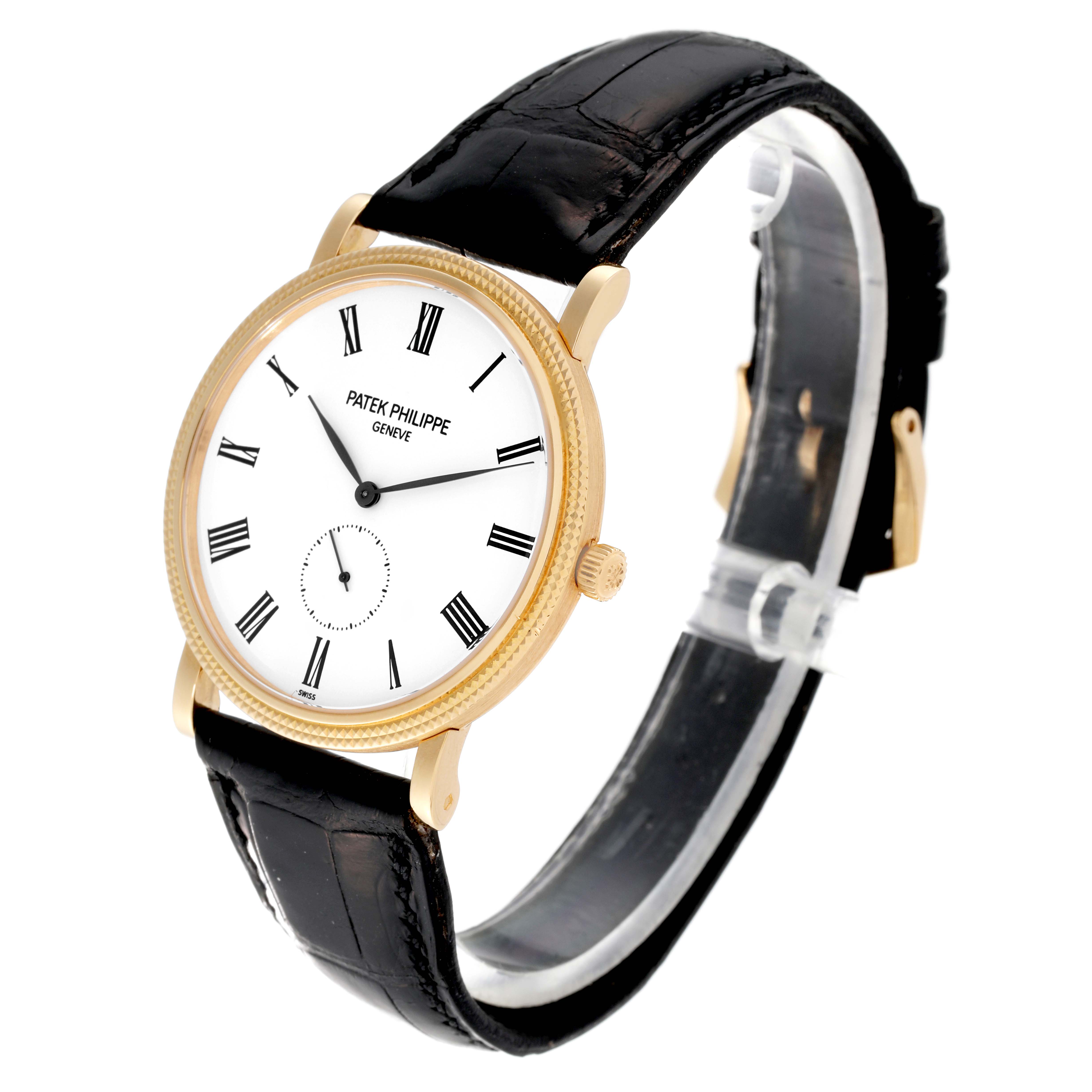 The image shows a Calatrava model by Patek Philippe at an angle highlighting the dial, case, strap, and crown.