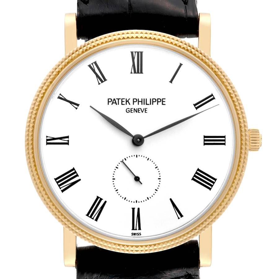 The image shows a Patek Philippe Calatrava watch from a front angle, highlighting its dial, hands, bezel, and part of the strap.