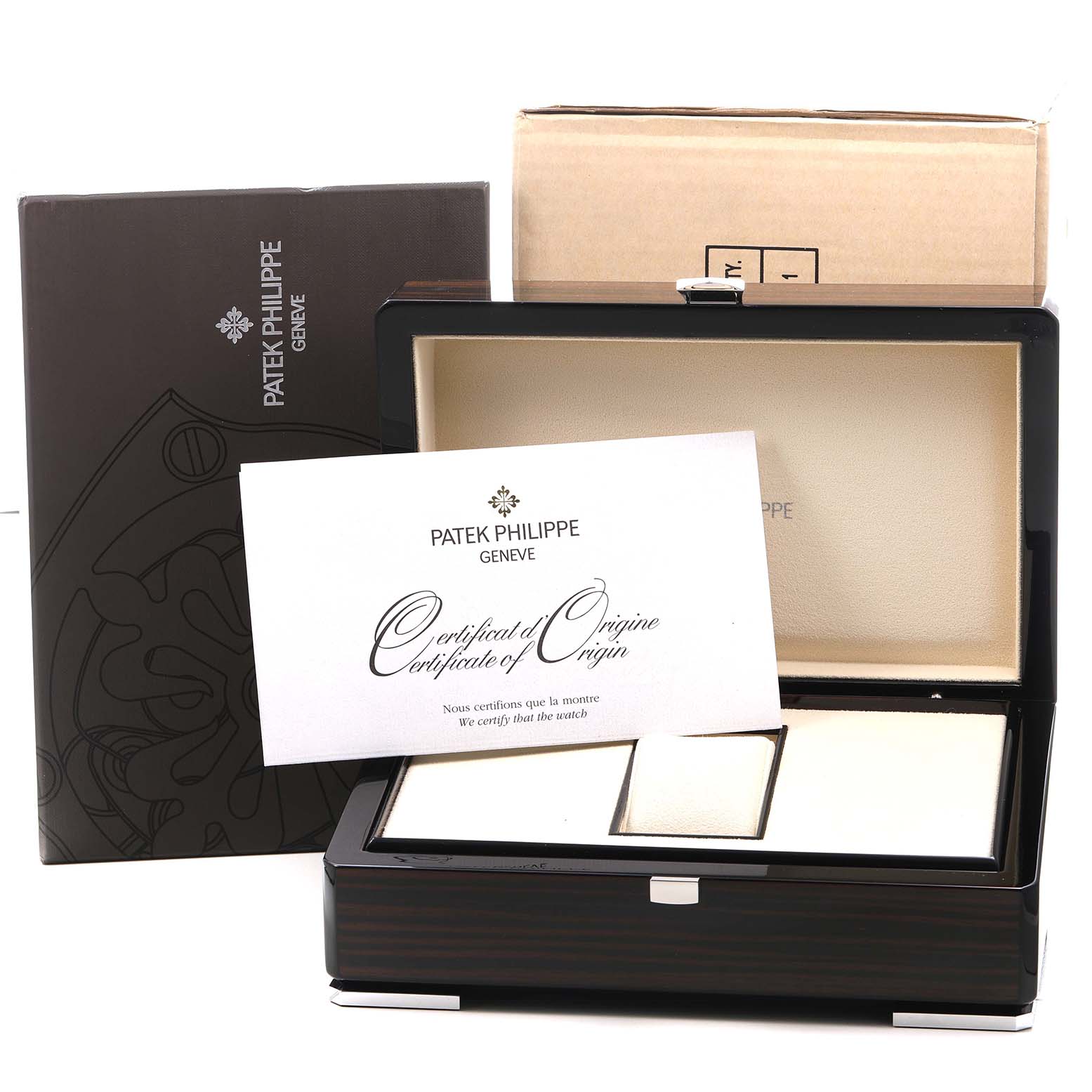 The image shows a Patek Philippe Nautilus 7010 7010G Women's White Gold Silver Dial watch box, certificate, and packaging from a frontal angle.