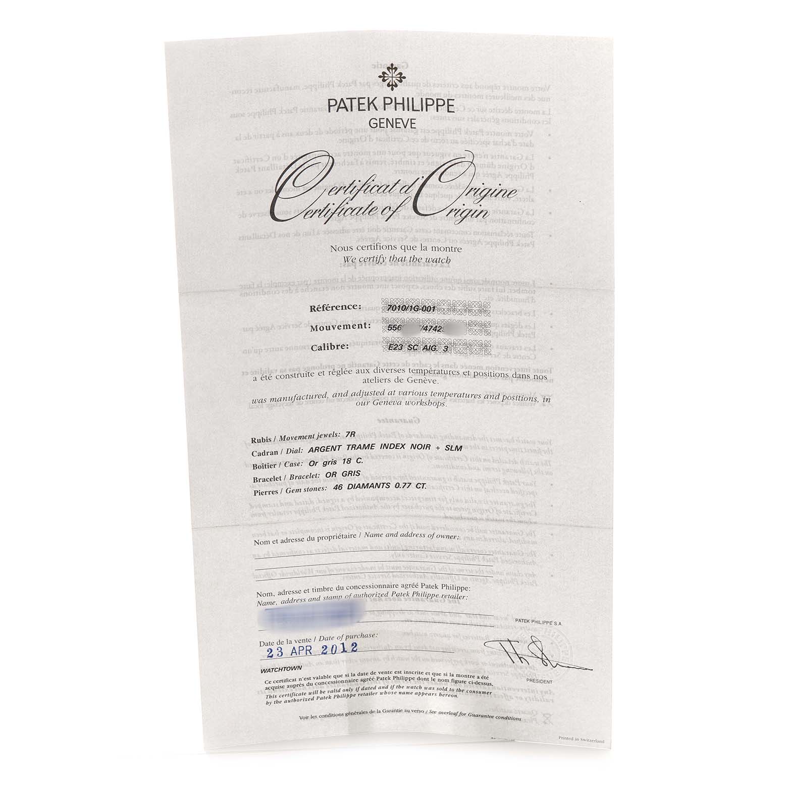 The image shows the Certificate of Origin for a Patek Philippe Nautilus 7010 7010G Women's White Gold Silver Dial model watch.