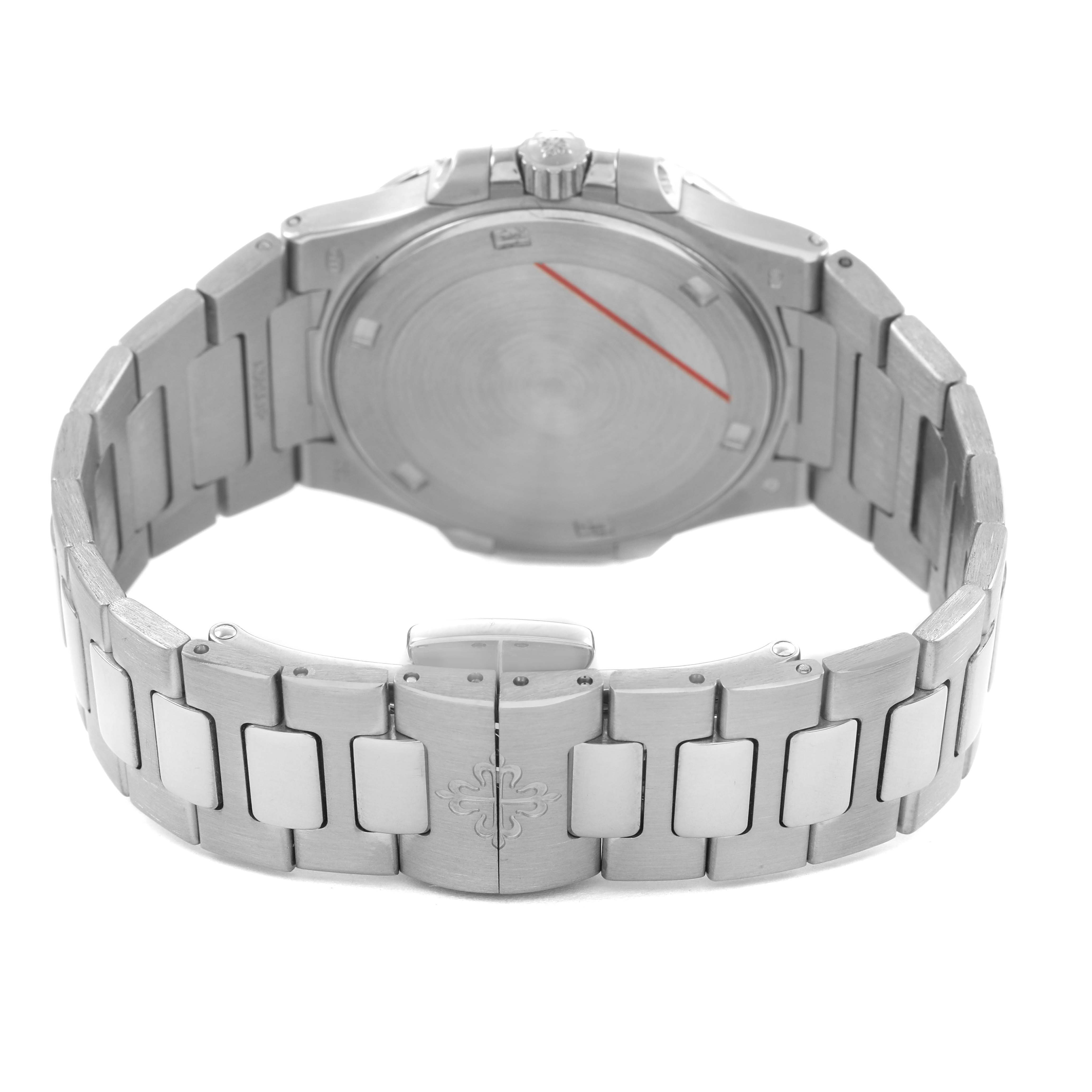 The image shows the back and bracelet of the Patek Philippe Nautilus 7010 7010G Women's White Gold Silver Dial watch, featuring a closed clasp with the brand's emblem.