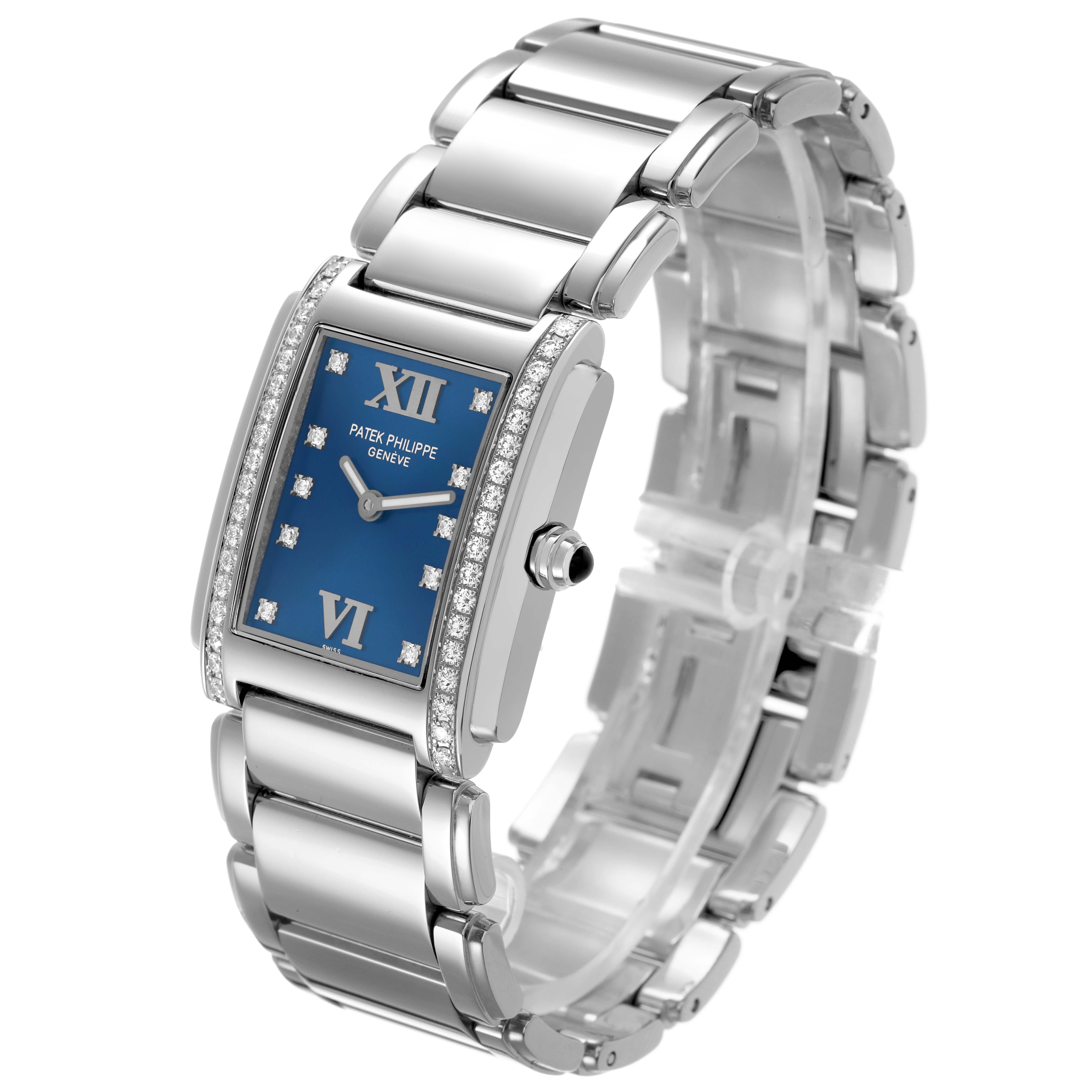 The Patek Philippe Twenty-4 4910/10A-012 Women's Stainless Steel Blue Dial watch is shown at an angle highlighting the blue dial, diamond accents, and stainless steel bracelet.