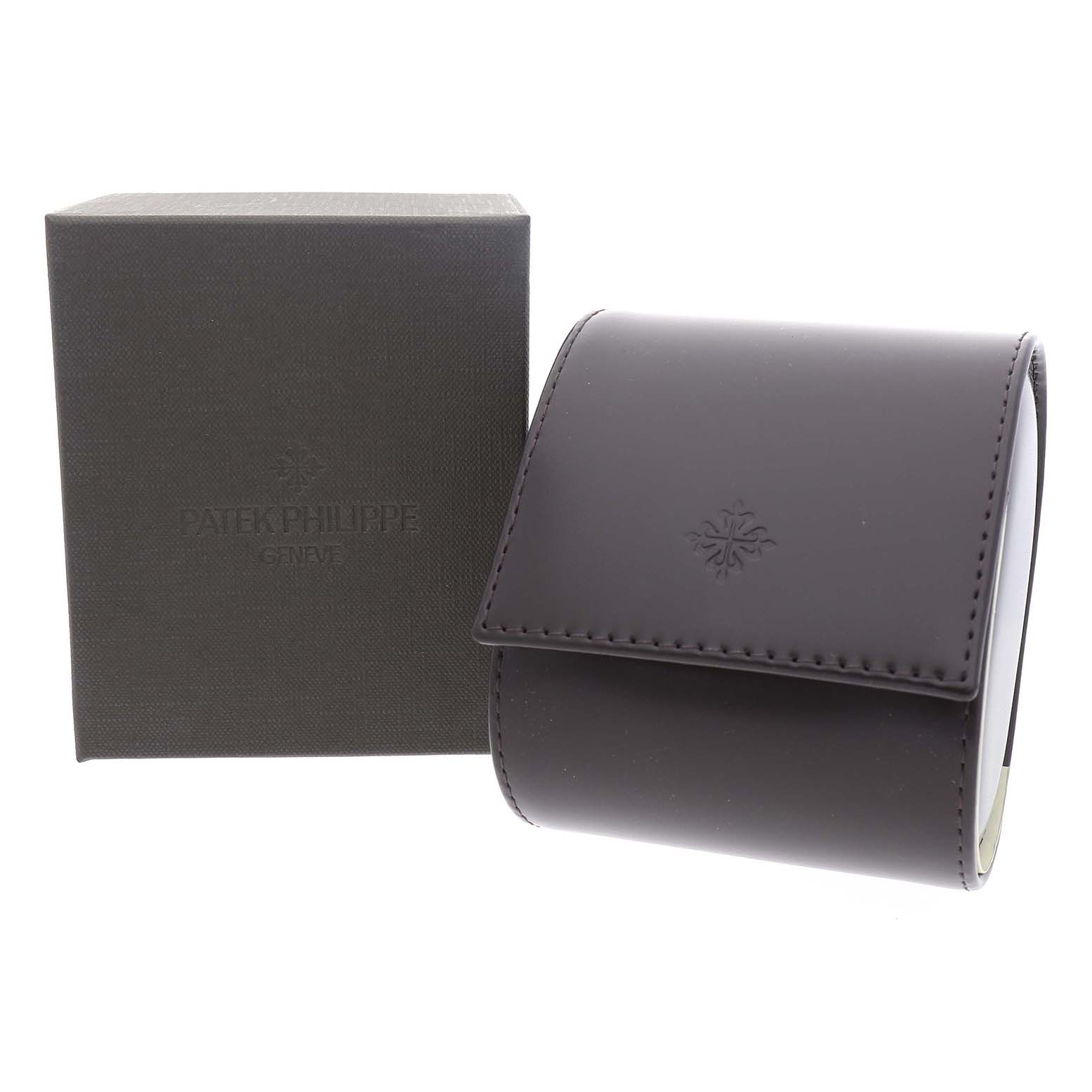 The image shows the packaging for a Patek Philippe Twenty-4 4910/10A-012 Women's Stainless Steel Blue Dial watch, including a branded box and a dark leather case.