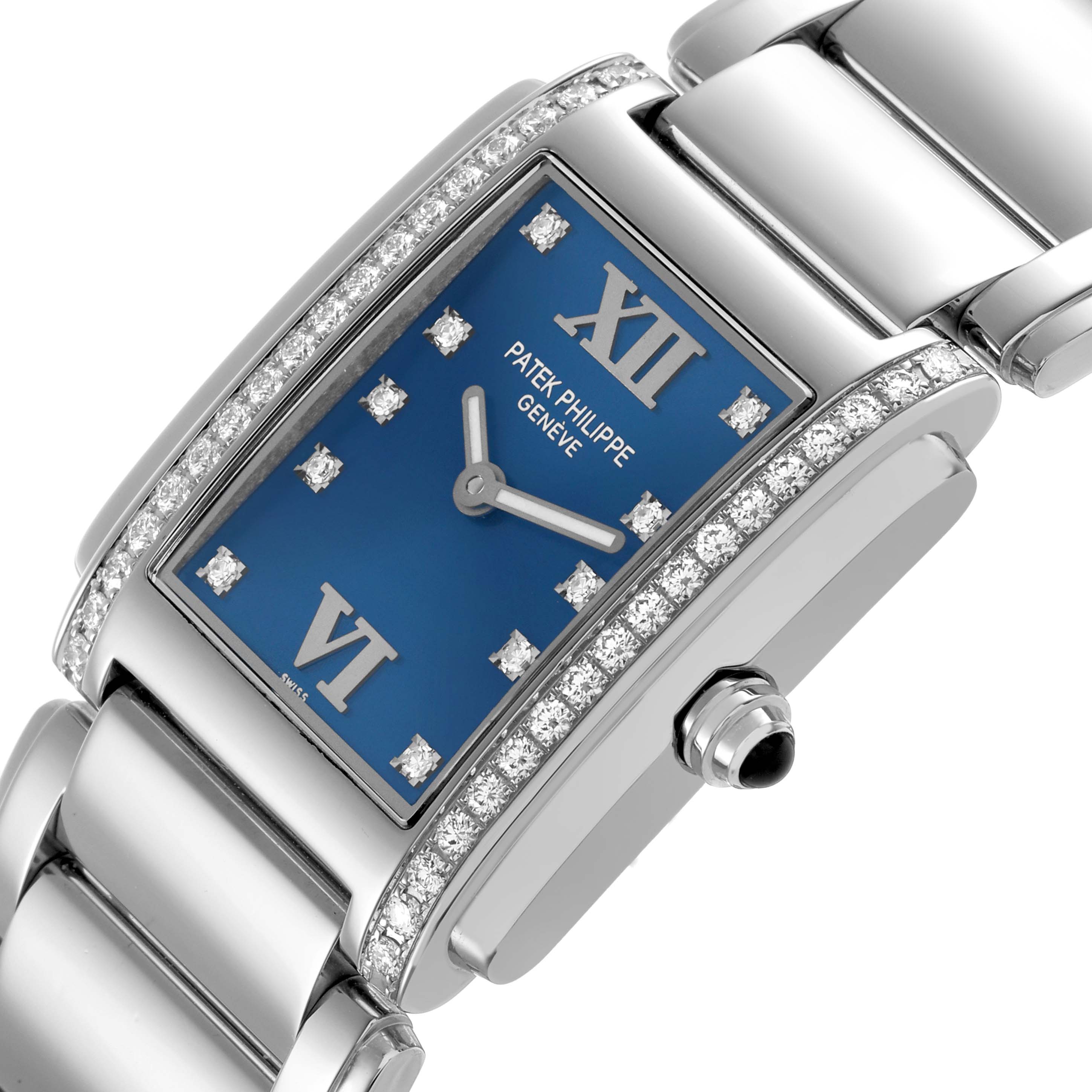 The Patek Philippe Twenty-4 4910/10A-012 Women's Stainless Steel Blue Dial watch is shown from a slight angled view, highlighting the blue dial, diamond markers, and crown.