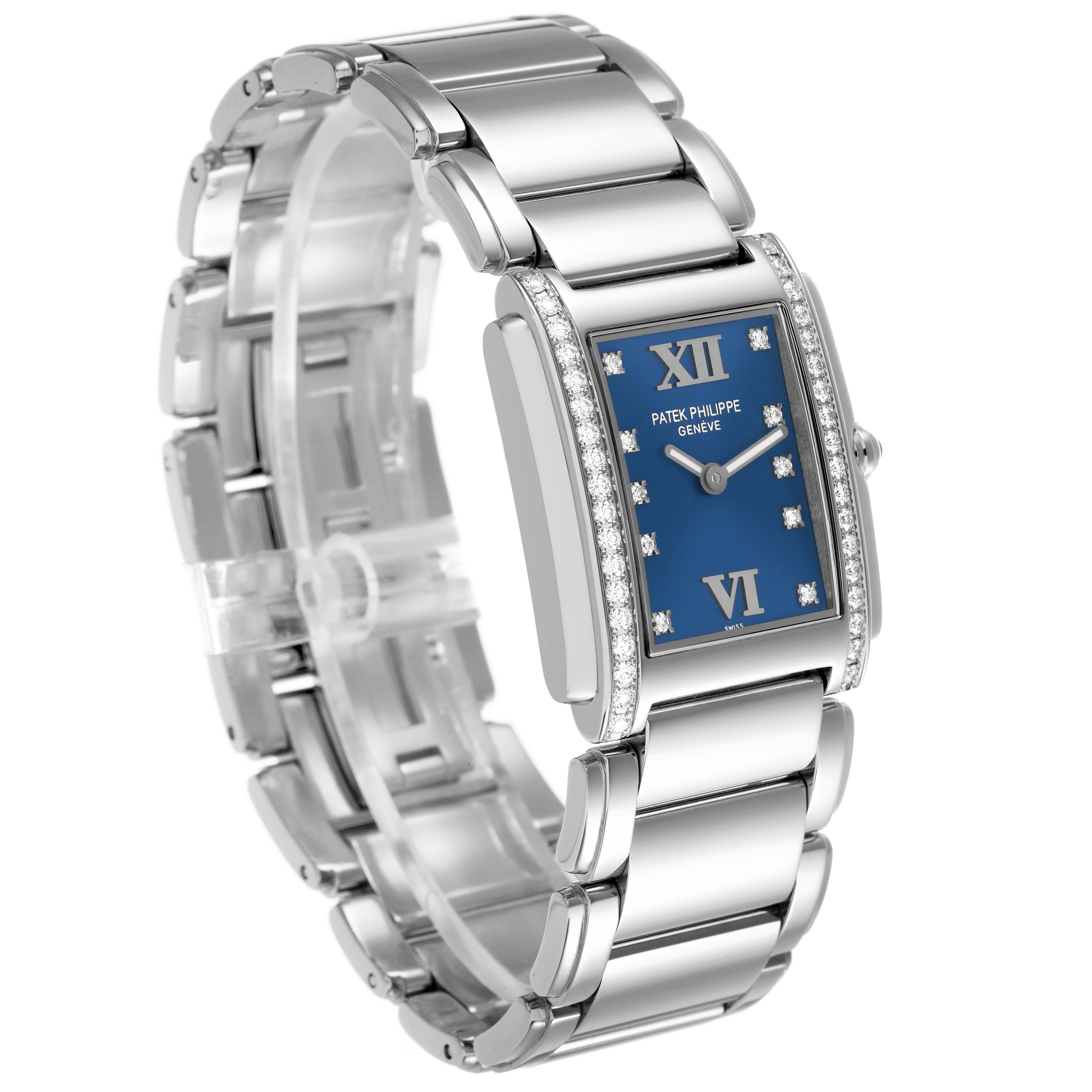 The Patek Philippe Twenty-4 4910/10A-012 Women's Stainless Steel Blue Dial watch is shown at a three-quarter angle, highlighting the blue dial, diamond-set bezel, and stainless steel bracelet.