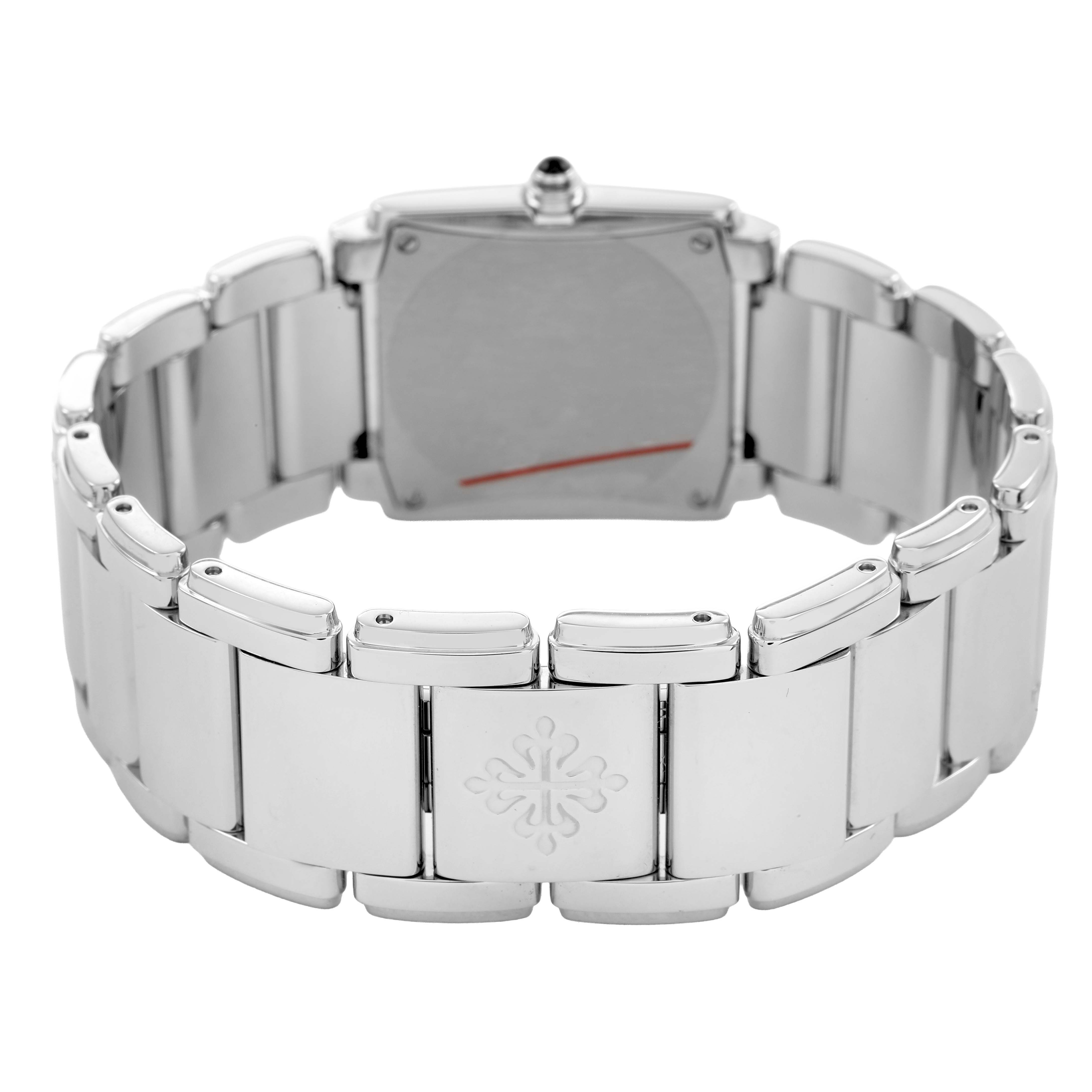 The image shows the back of a Patek Philippe Twenty-4 4910/10A-012 Women's Stainless Steel Blue Dial watch, focusing on the bracelet and clasp area.