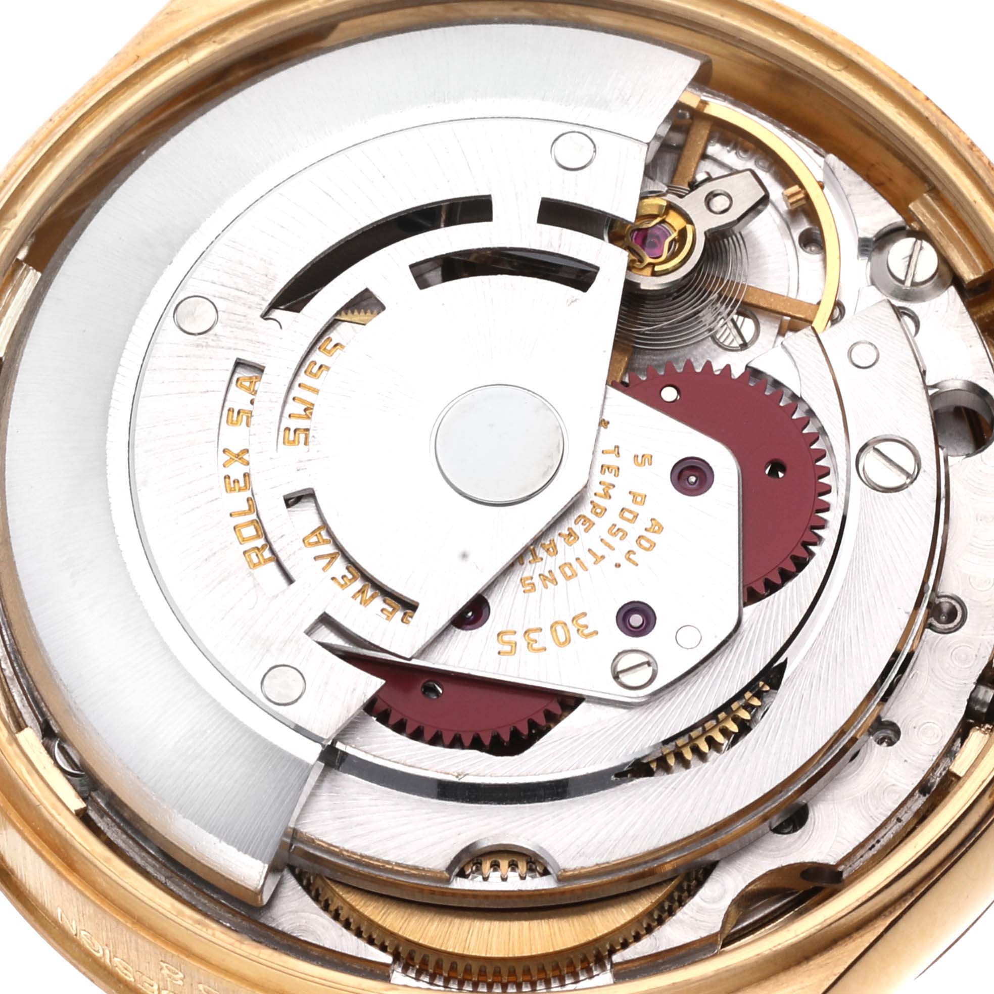 The image shows the movement of a Rolex Date 15038 Men's Yellow Gold Champagne Dial 15038 Men's Yellow Gold Champagne Dial model watch viewed from the back, highlighting its intricate internal mechanisms.
