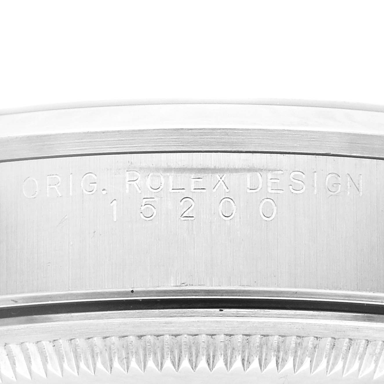 This image shows an angled close-up of the Rolex Date 15200 Men
s Stainless Steel Blue Dial 15200 Men
s Stainless Steel Blue Dial model 15200
s case side engraving and part of its bezel teeth.