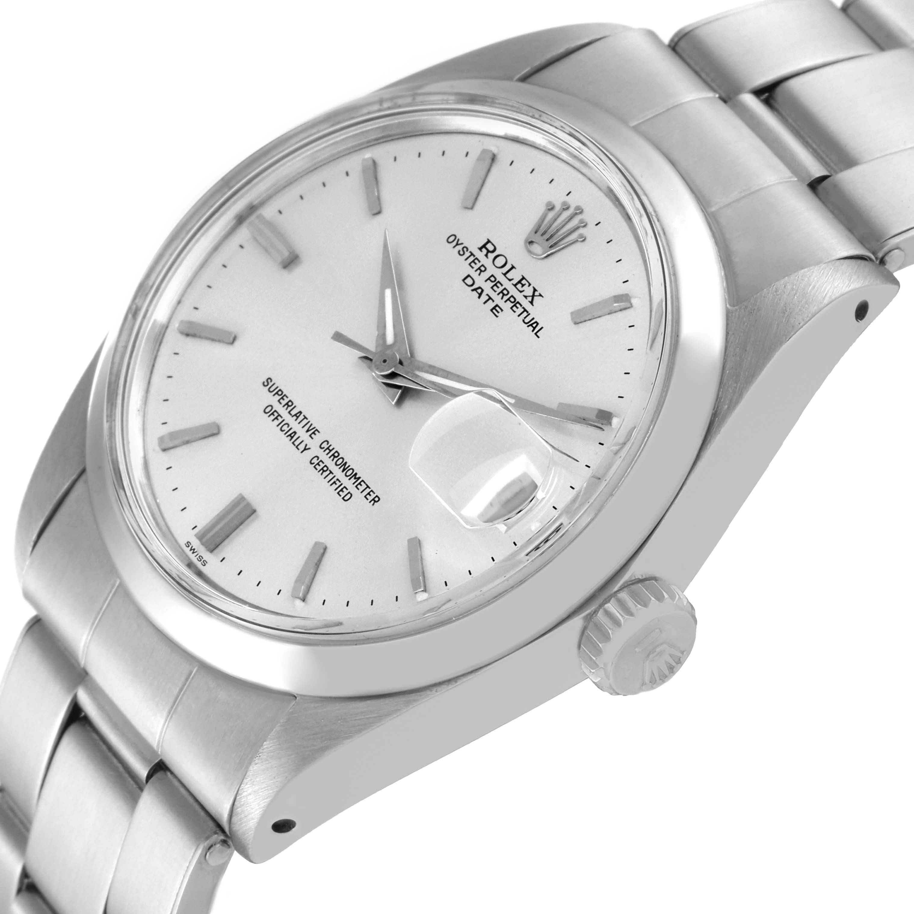 The image shows a close-up of the Rolex Date 1500 Men's Stainless Steel Silver Dial 1500 Men's Stainless Steel Silver Dial model watch, highlighting the face, bezel, crown, and part of the stainless steel bracelet.