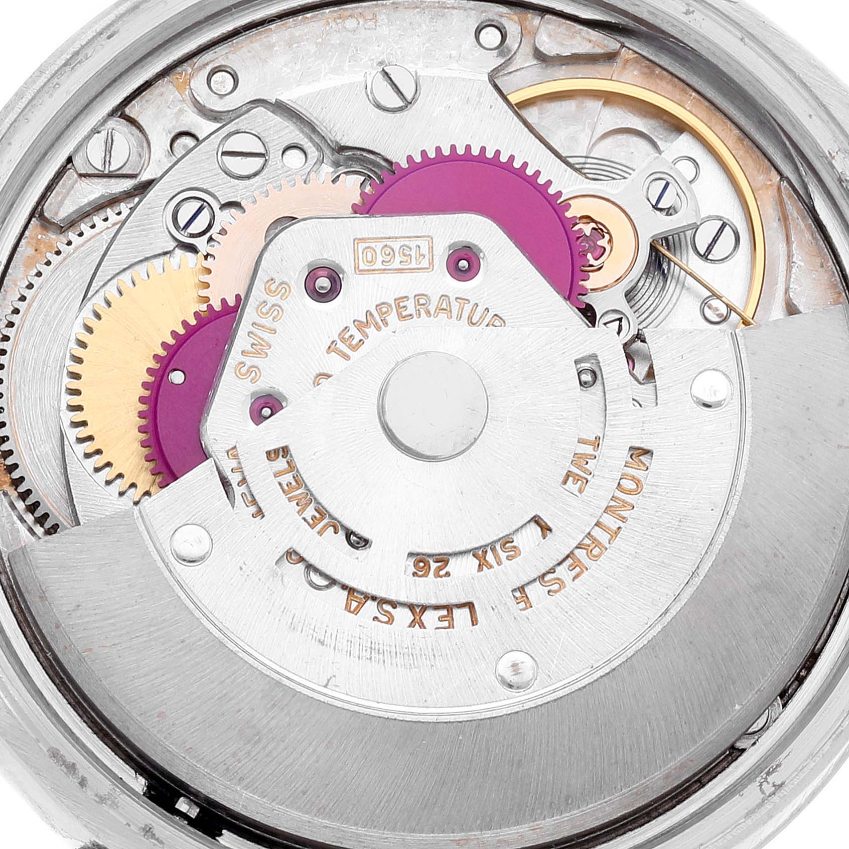 This is a close-up view of the internal movement mechanism of a Rolex Date 1500 Men's Stainless Steel Silver Dial 1500 Men's Stainless Steel Silver Dial model watch.