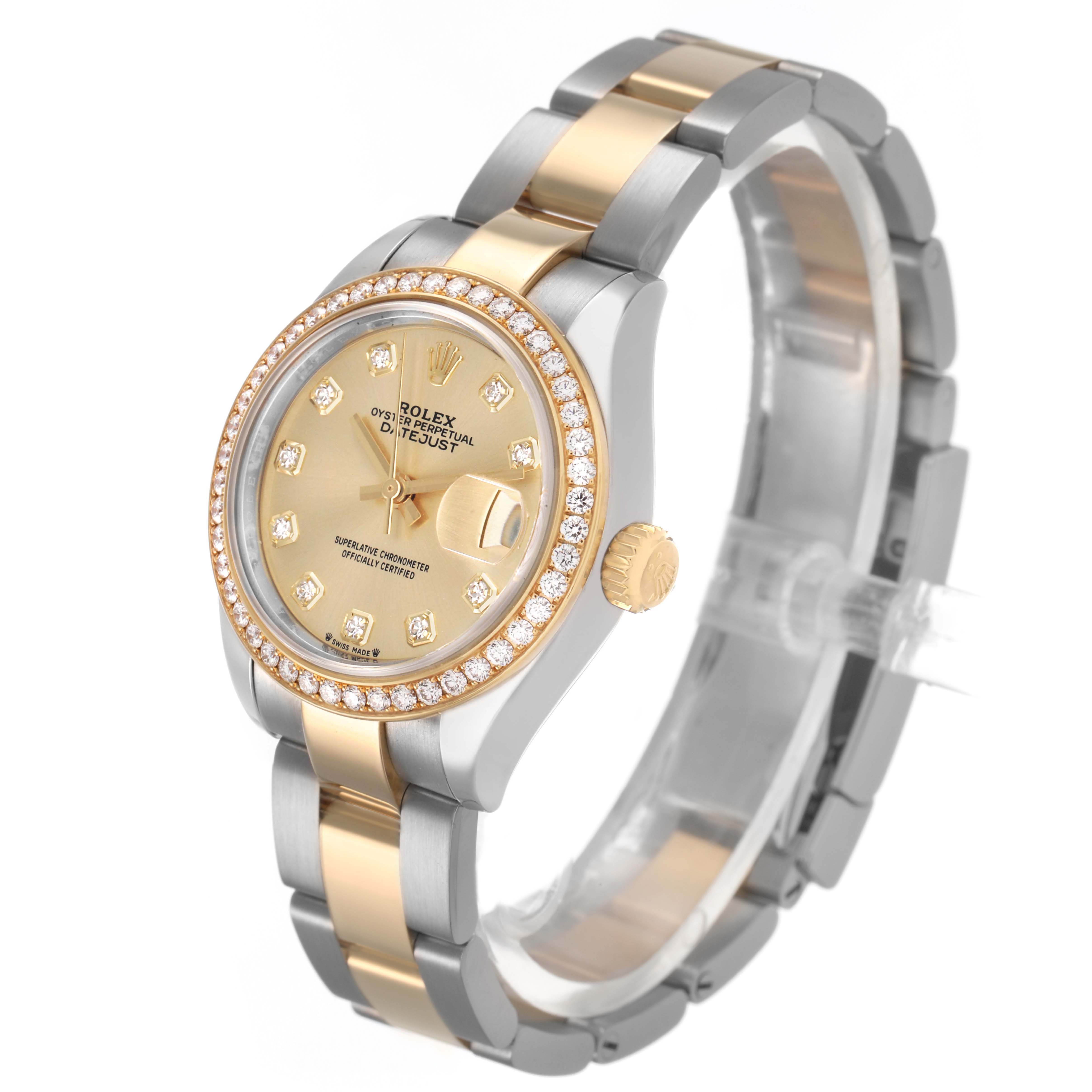 The Rolex Datejust 279383 Women's Steel and Gold (two tone) Champagne Dial watch is shown at an angled side view, highlighting the bezel, crown, dial, and bracelet.