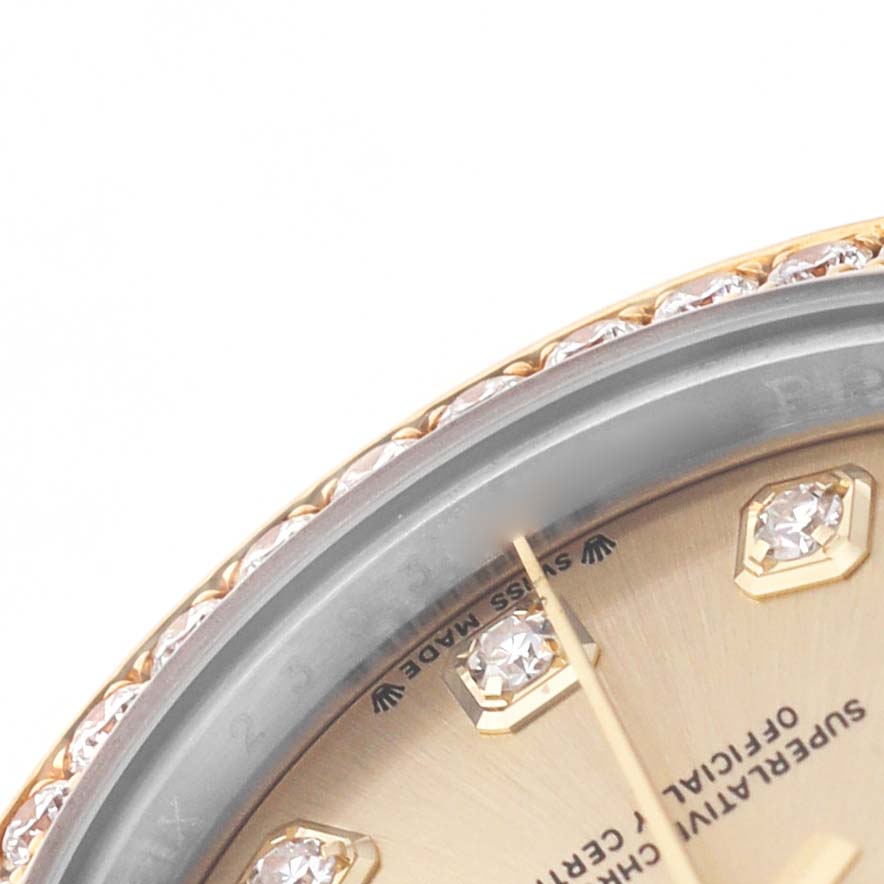 The image shows a close-up of the Rolex Datejust 279383 Women's Stainless Steel Champagne Dial dial, showcasing diamond hour markers and part of the bezel.