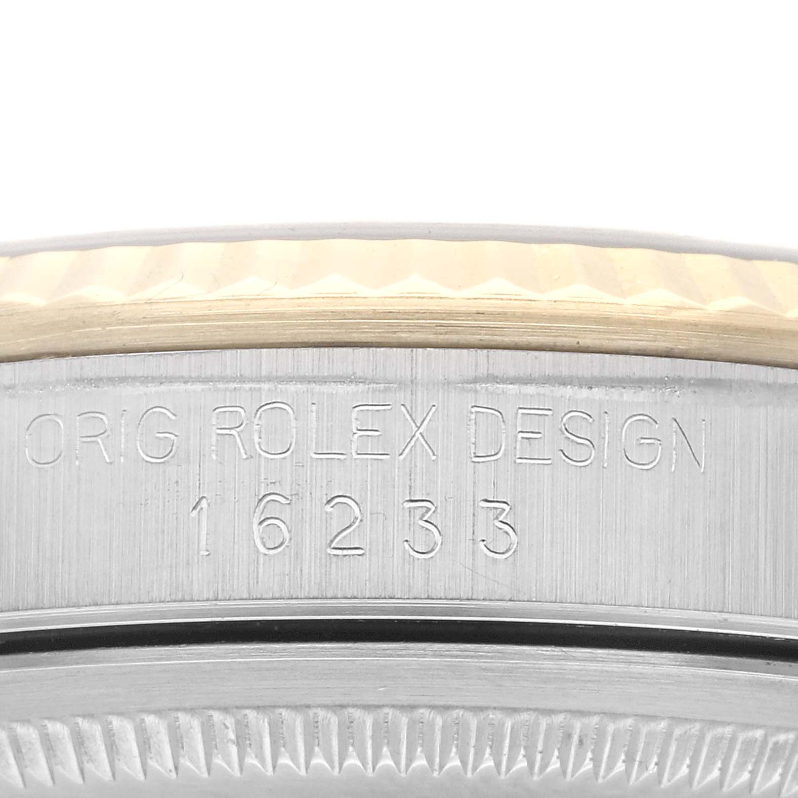 This image shows the side view of the Rolex Datejust 16233 Men's Steel and Gold (two tone) Black Dial 16233 Men's Steel and Gold (two tone) Black Dial model, highlighting the case with the engraving "ORIG ROLEX DESIGN 16233".