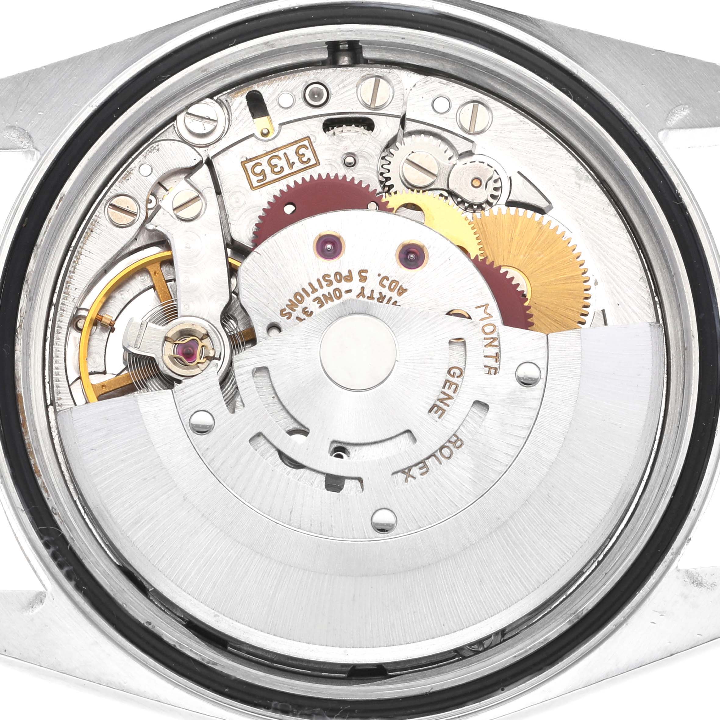 This image shows the internal mechanism and movement parts of a Rolex Datejust 16233 Men's Steel and Gold (two tone) Black Dial 16233 Men's Steel and Gold (two tone) Black Dial watch viewed from the back.