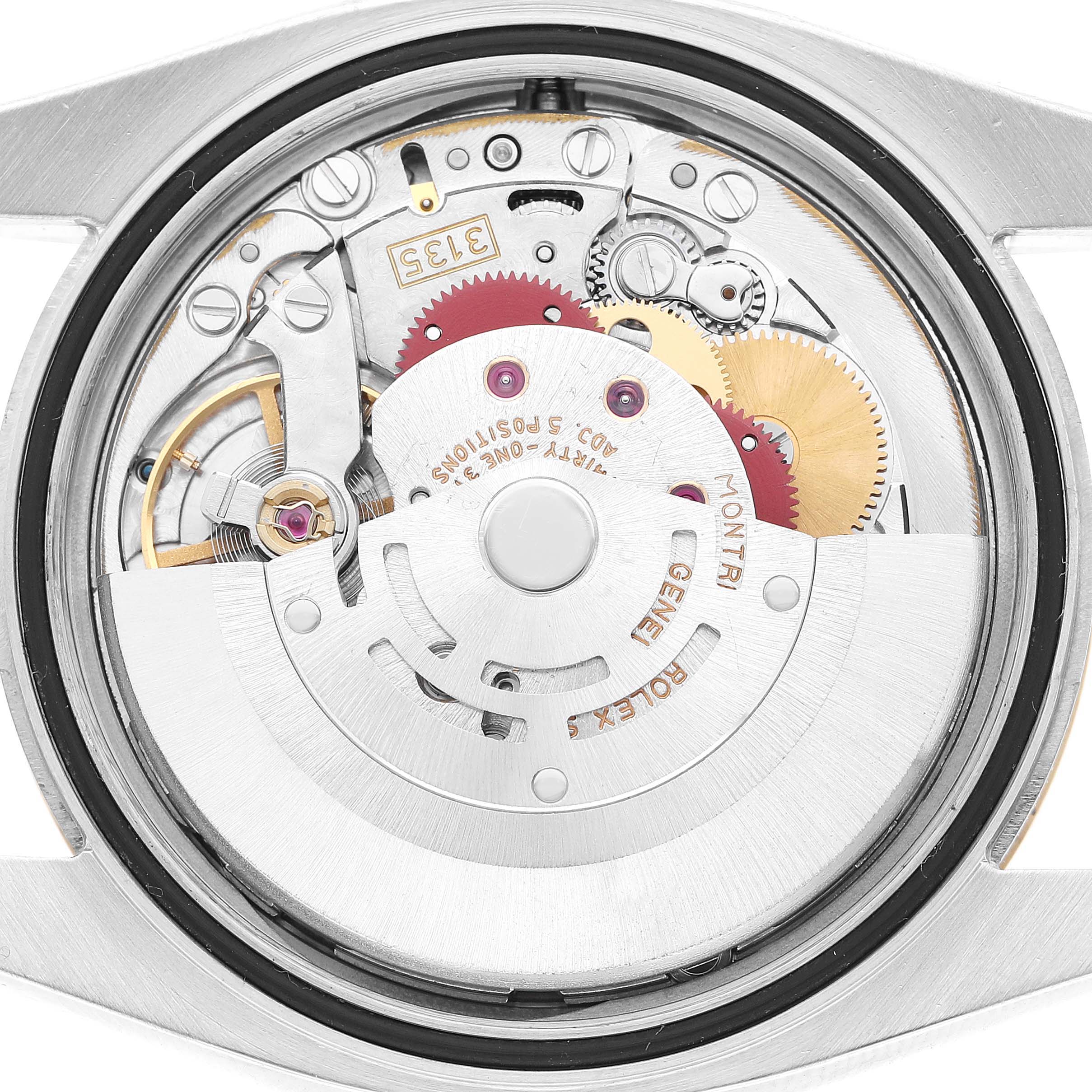The image shows the movement of a Rolex Datejust 116233 Men's Steel and Gold (two tone) White Dial watch from the back, highlighting gears and internal components.