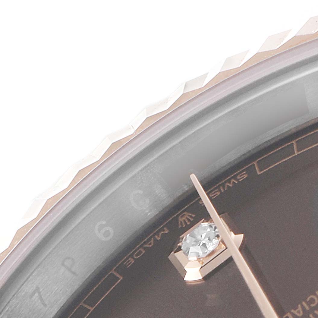 The image shows a close-up of the dial and fluted bezel of the Rolex Datejust 41 126331 Men's Steel and Gold (two tone) Brown Dial 126331 Men's Steel and Gold (two tone) Brown Dial watch.