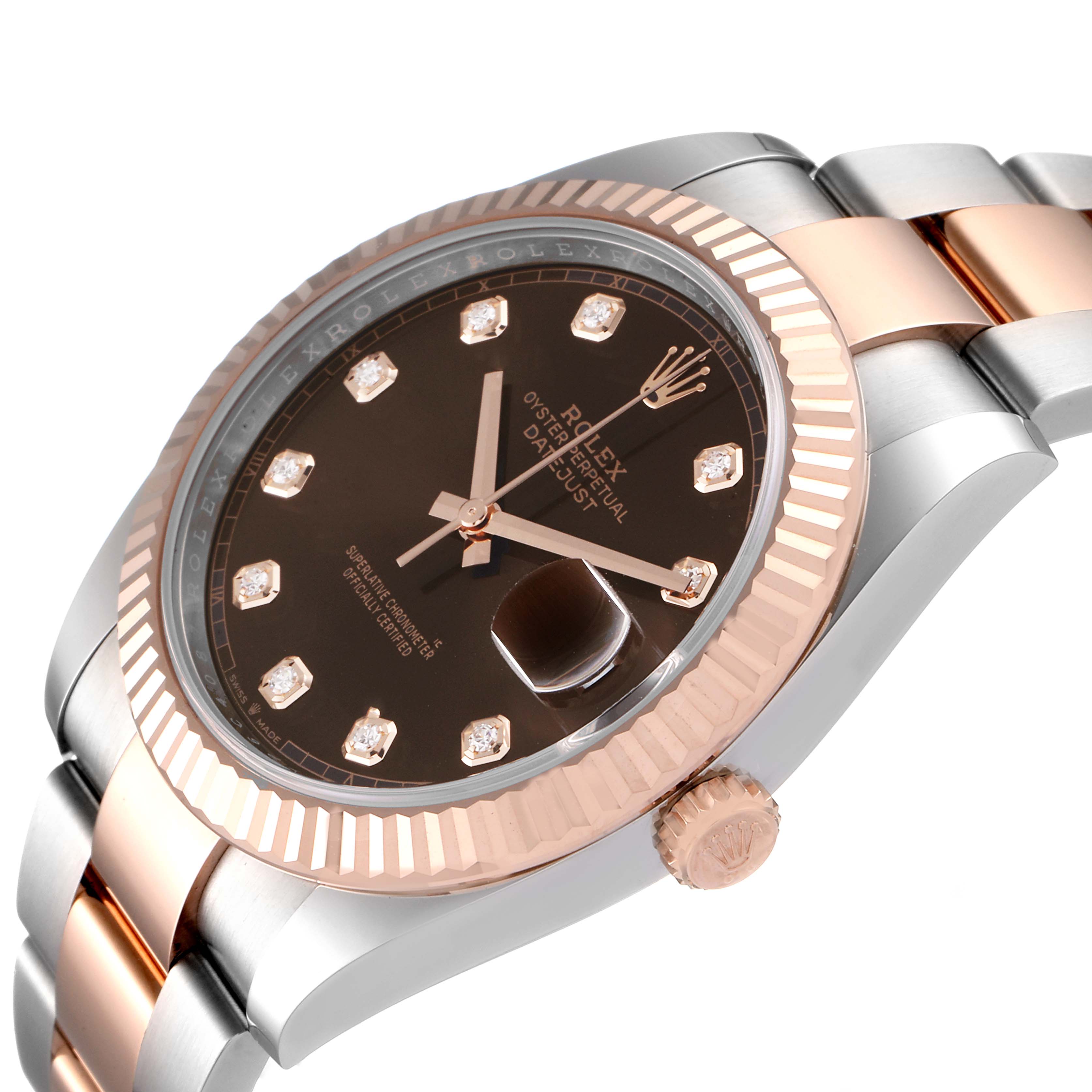 The image shows a close-up, angled view of the Rolex Datejust 41 126331 Men's Steel and Gold (two tone) Brown Dial 126331 Men's Steel and Gold (two tone) Brown Dial watch, highlighting its dial, bezel, and part of the bracelet.