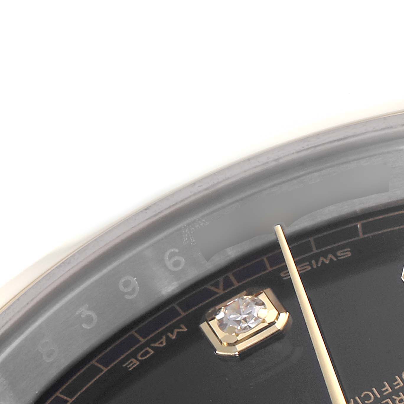 This image shows a close-up angle of the Datejust 41 model by Rolex, focusing on the dial with a diamond hour marker and the minute hand.