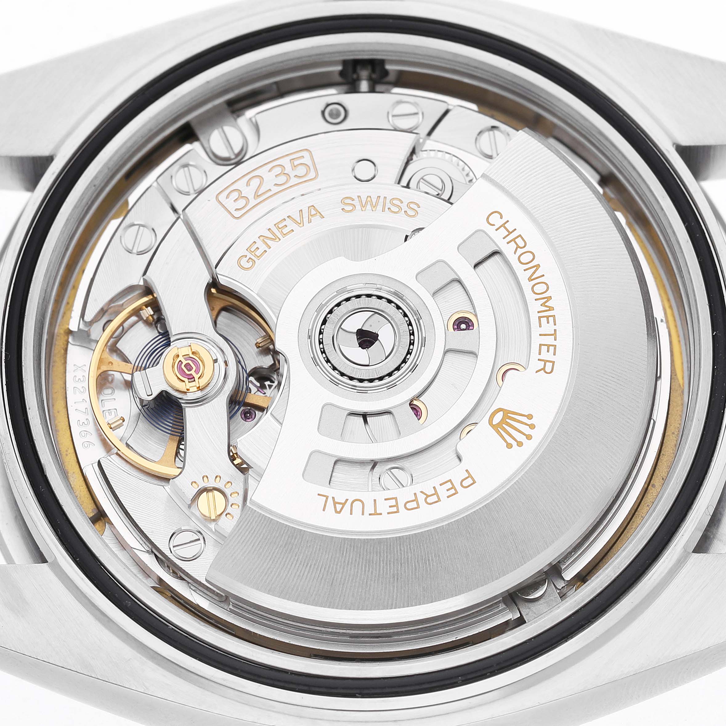 This image shows the movement from the back of a Rolex Datejust 41 126300 Men's Stainless Steel White Dial, highlighting the rotor and intricate components.