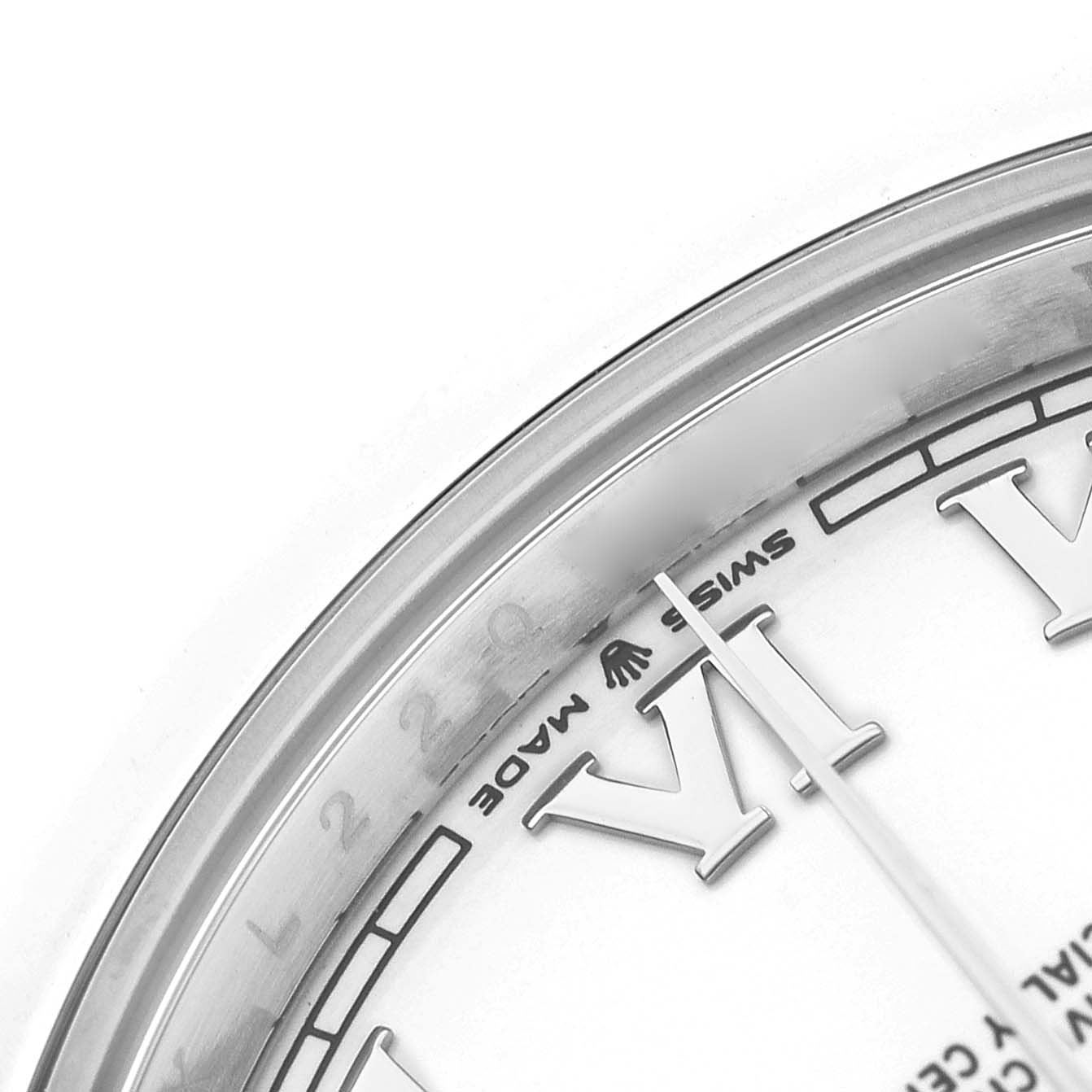 The image shows a close-up of the dial edge and Roman numeral markers on the Rolex Datejust 41 126300 Men's Stainless Steel White Dial.