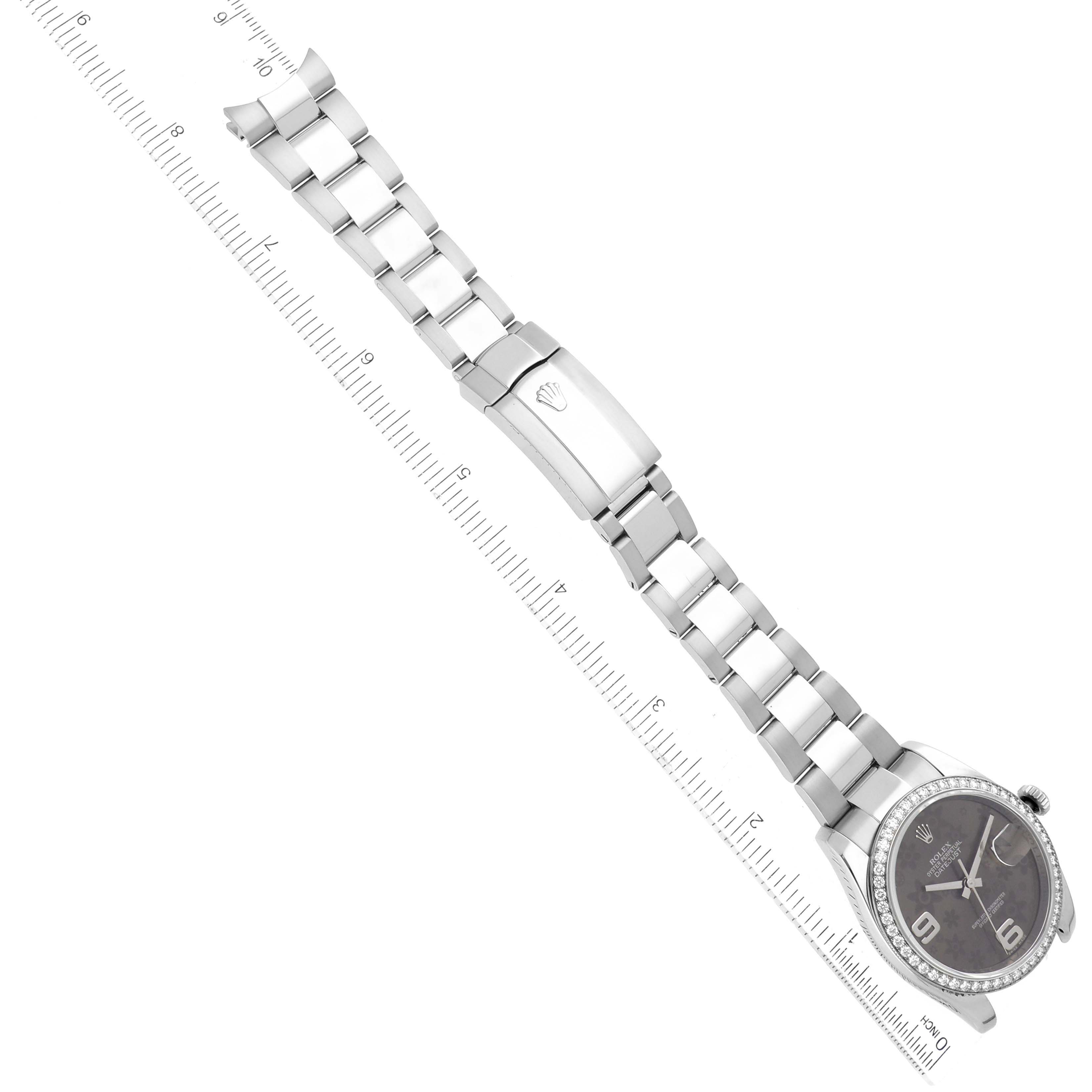 The image shows a top-down view of a Rolex Datejust 116244 Men's Stainless Steel Brown Dial 116244 Men's Stainless Steel Brown Dial watch, featuring its bracelet, clasp, and watch face.