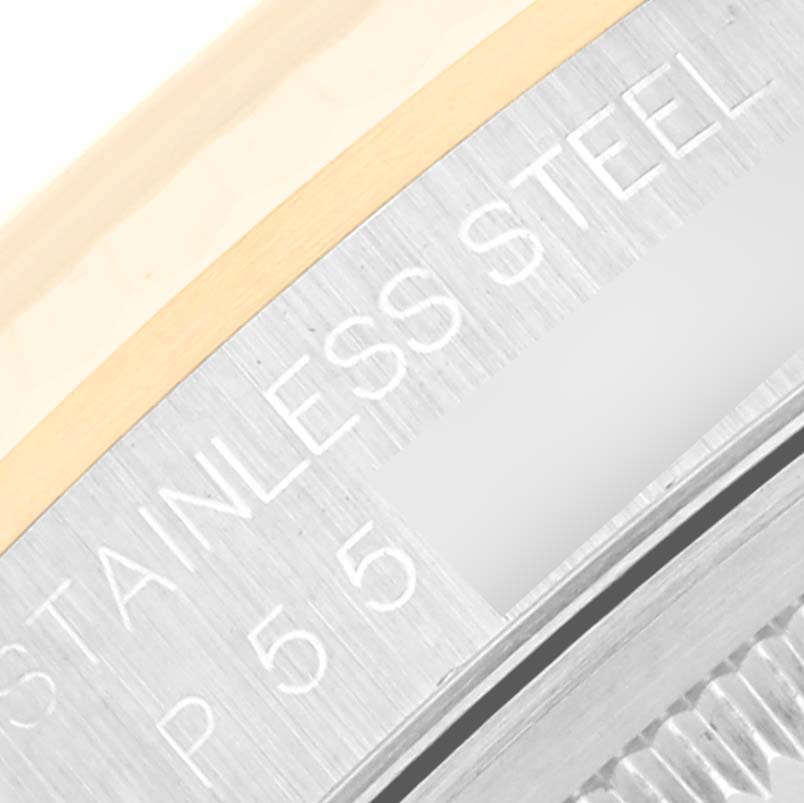 The image shows a close-up of the side of the caseback of a Rolex Datejust 16233 Men's Steel and Gold (two tone) Champagne Dial 16233 Men's Steel and Gold (two tone) Champagne Dial, highlighting the stainless steel inscription.