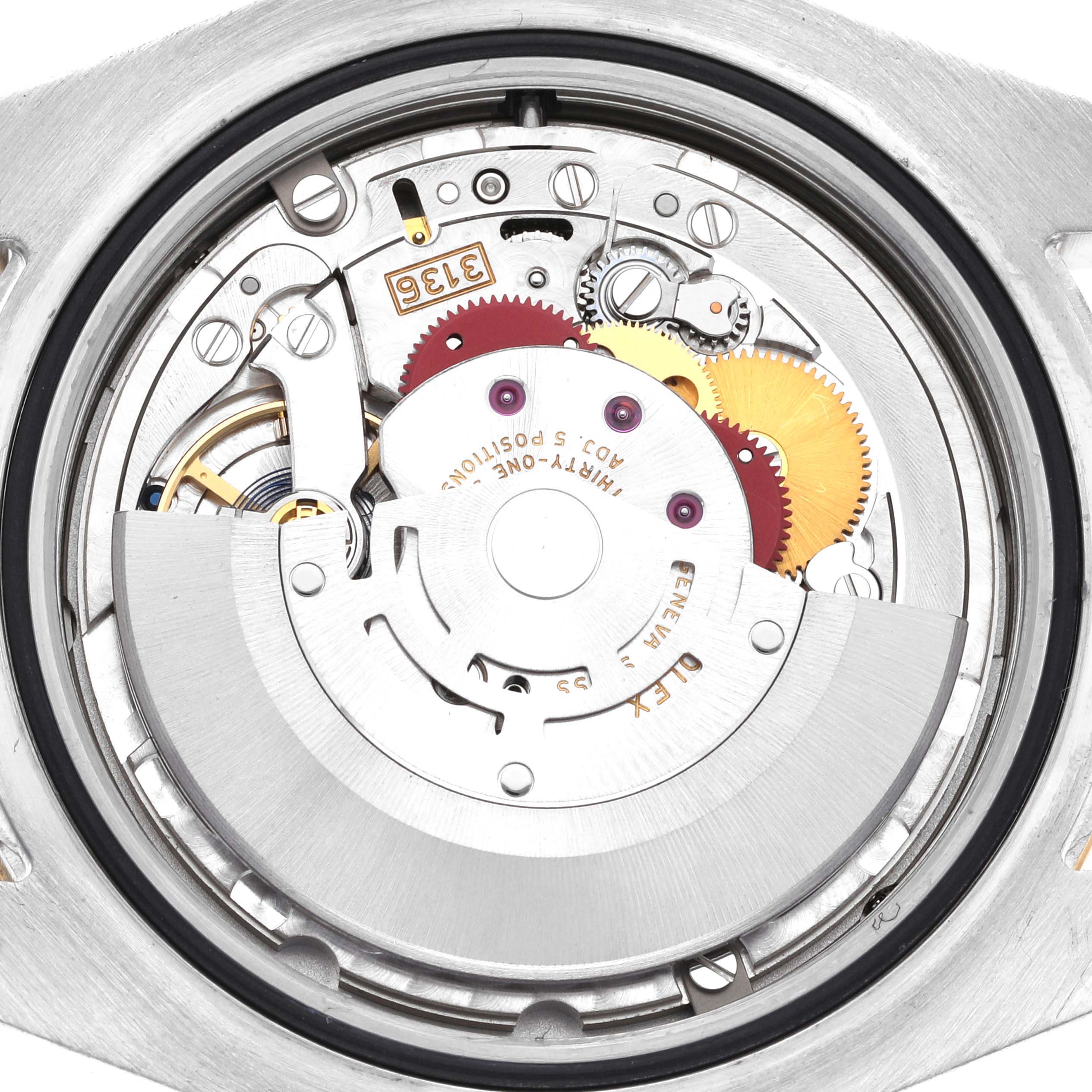 This close-up image shows the inner mechanical movement of the Rolex Datejust 41 116333 Men's Steel and Gold (two tone) Champagne Dial 116333 Men's Steel and Gold (two tone) Champagne Dial watch, including various gears and components.