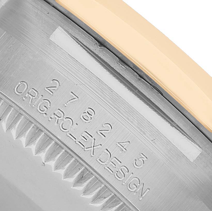 The image shows a close-up of the case side of the Rolex Mid-Size 278243 Women's Steel and Gold (two tone) Champagne Dial model, highlighting the engraved serial and design numbers.