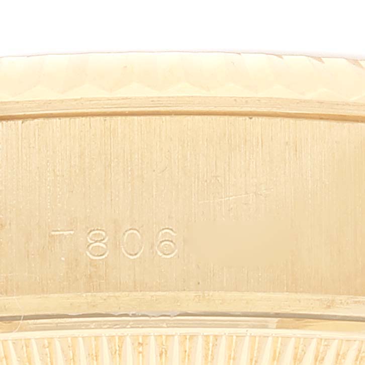 This image shows a close-up of the engraved part of the President model watch by Rolex.