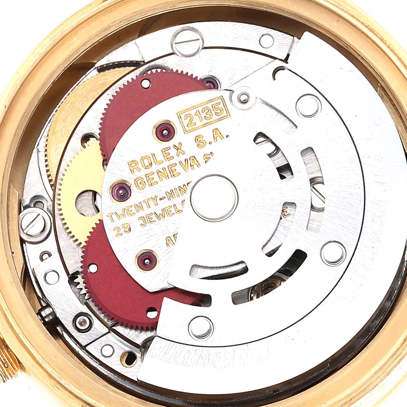 The image shows the inner mechanical movement parts of the Rolex President 69178 Women
s Yellow Gold Champagne Dial 69178 Women
s Yellow Gold Champagne Dial model, including gears and the rotor.
