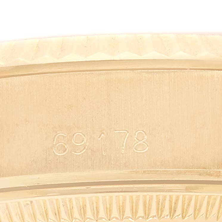 This image shows a close-up of the model number "69178" engraved on the side of a Rolex President 69178 Women
s Yellow Gold Champagne Dial 69178 Women
s Yellow Gold Champagne Dial watch case.