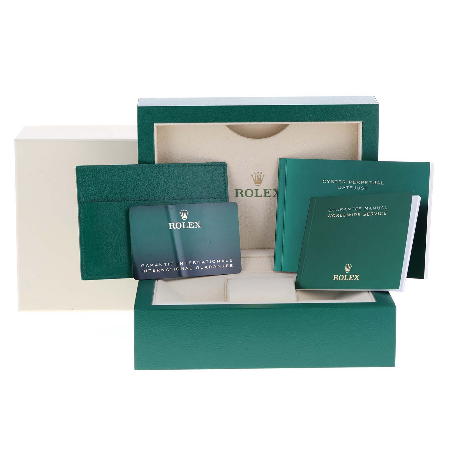 The image shows the packaging, warranty card, and manuals for a Rolex Datejust 126234 Men
s Stainless Steel Black Dial 126234 Men
s Stainless Steel Black Dial watch, presented from a front angle.