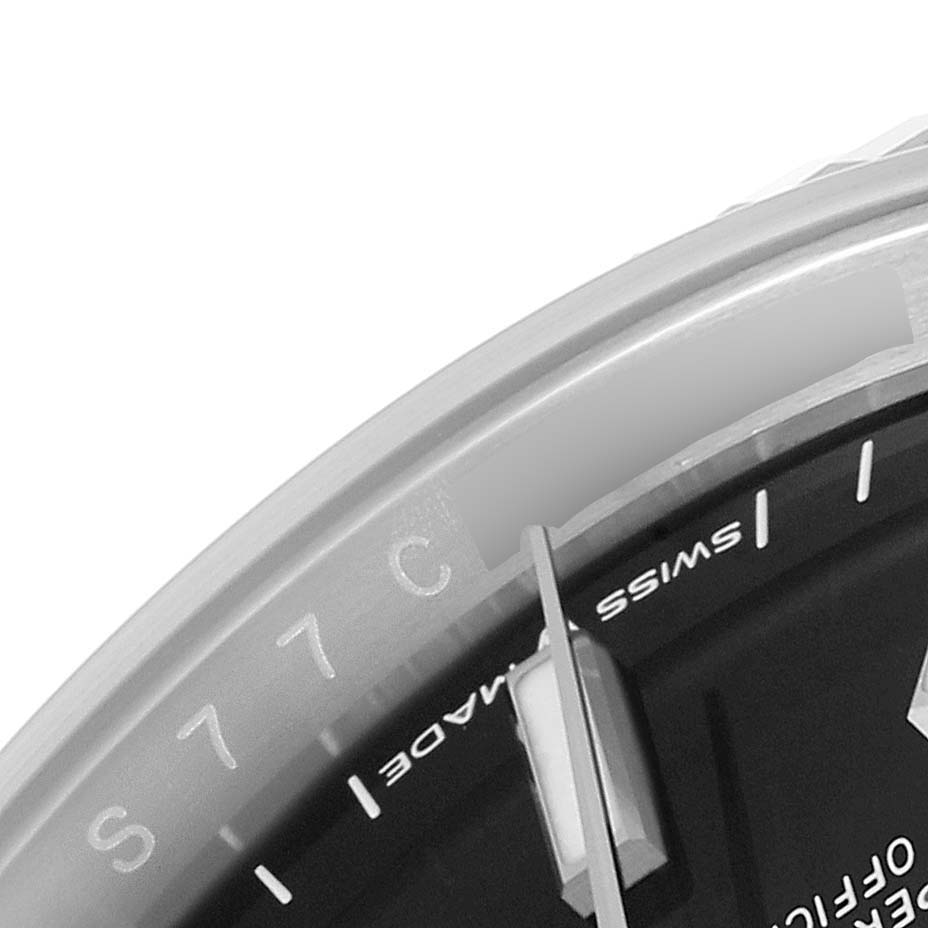 This image displays a close-up angle of the dial and part of the bezel of a Rolex Datejust 126234 Men
s Stainless Steel Black Dial 126234 Men
s Stainless Steel Black Dial watch.