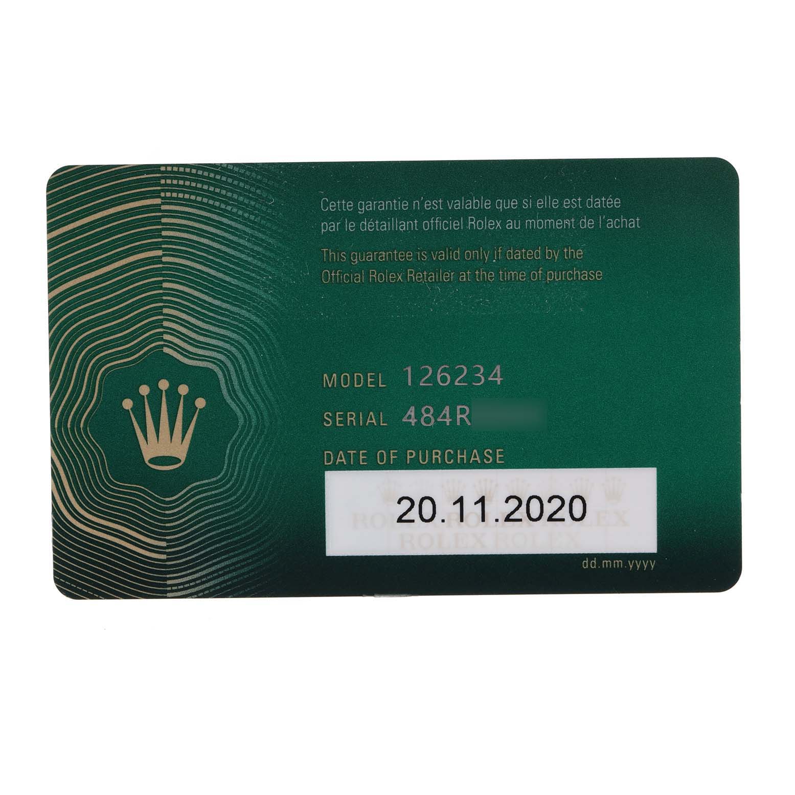 This is a close-up shot of the warranty card for a Rolex Datejust 126234 Men
s Stainless Steel Black Dial 126234 Men
s Stainless Steel Black Dial model 126234, showing the purchase date.