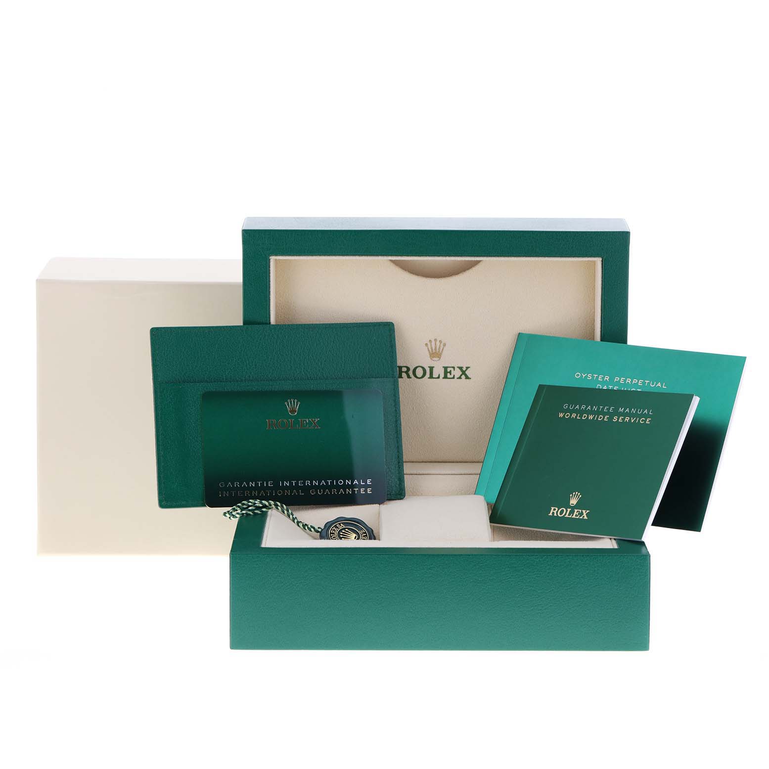 This image shows the packaging and accessories for a Rolex Datejust 126234 Men's Stainless Steel White Dial 126234 Men's Stainless Steel White Dial, including the box, guarantee card holder, and booklets.
