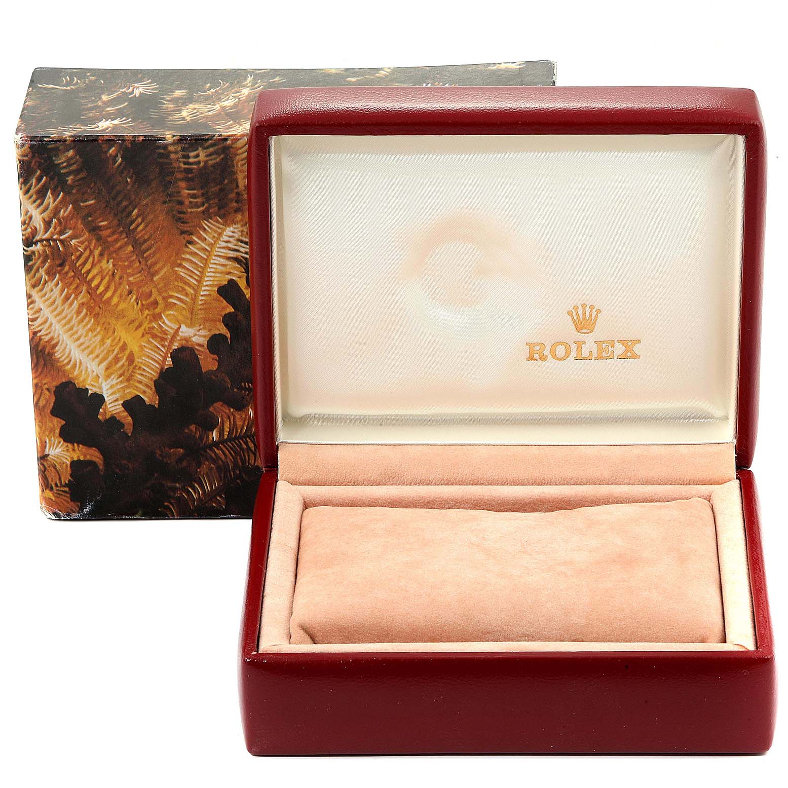 The image shows an open red Rolex box for the Datejust model, with the exterior packaging in the background.