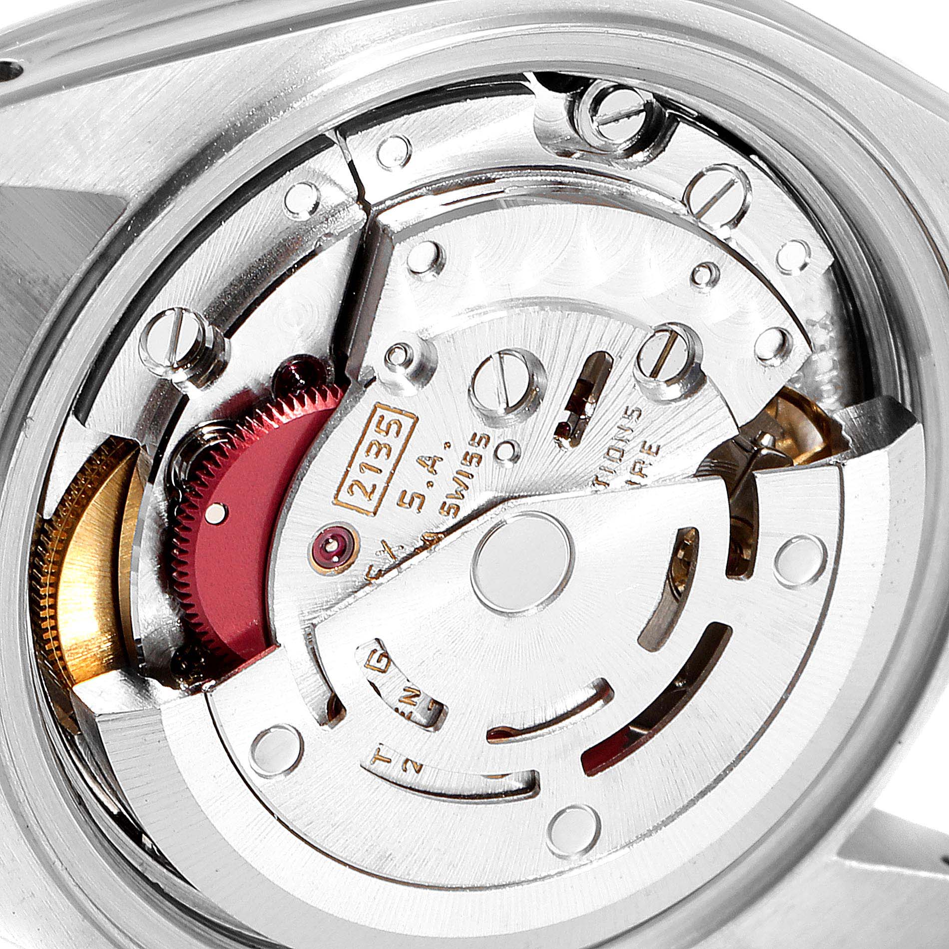 This image shows an interior view of the Rolex Datejust 69174 Women's Stainless Steel Silver Dial 69174 Women's Stainless Steel Silver Dial movement mechanism at a close-up angle.