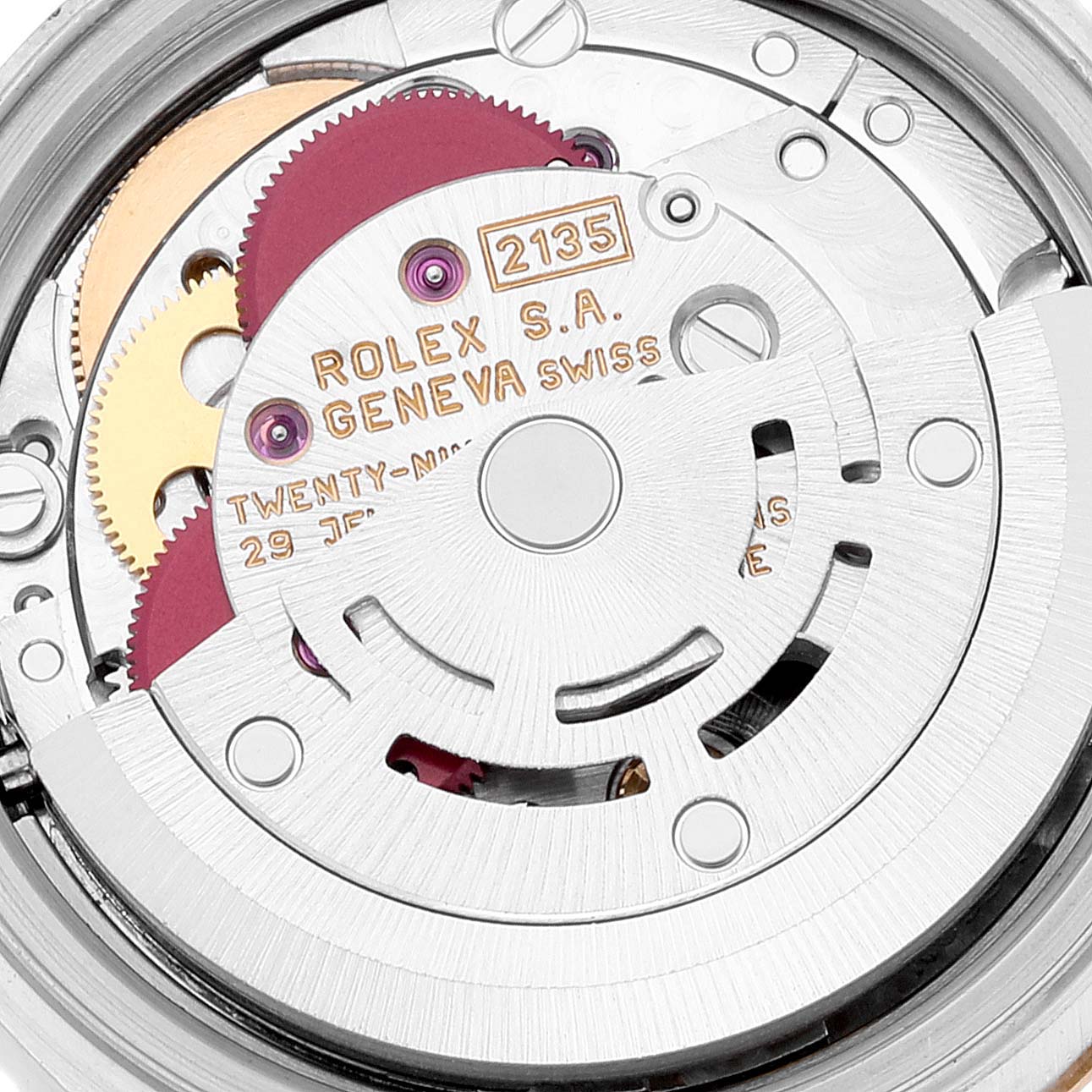 This image shows the movement mechanism of a Rolex Datejust 69173 Women's Steel and Gold (two tone) Beige Dial 69173 Women's Steel and Gold (two tone) Beige Dial watch, specifically focusing on its internal components and engraving.