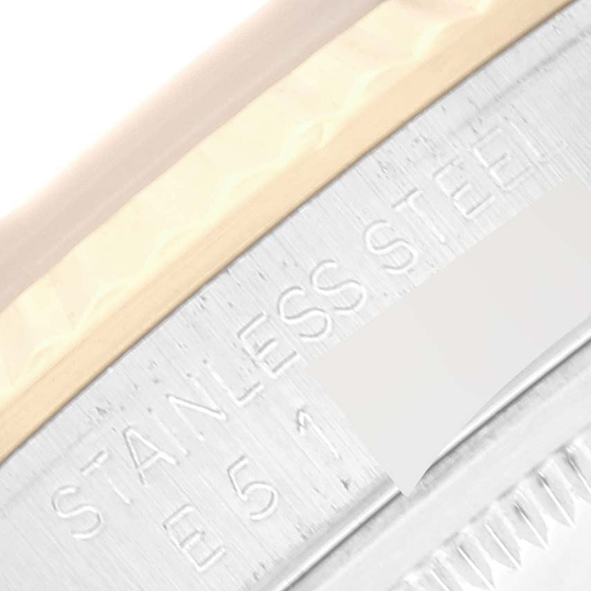 This image shows a close-up of the stainless steel case and bezel of a Rolex Datejust 16233 Men's Steel and Gold (two tone) Black Dial 16233 Men's Steel and Gold (two tone) Black Dial watch.