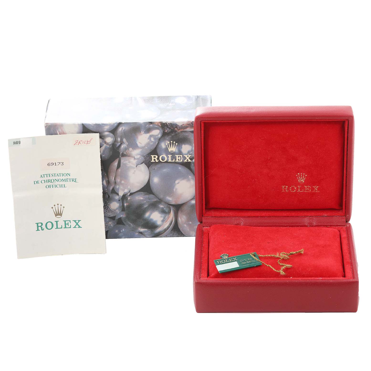 The image shows a Rolex Datejust 69173 Women's Steel and Gold (two tone) Champagne Dial 69173 Women's Steel and Gold (two tone) Champagne Dial watch box, official chronometer certificate, and packaging from a frontal angle.
