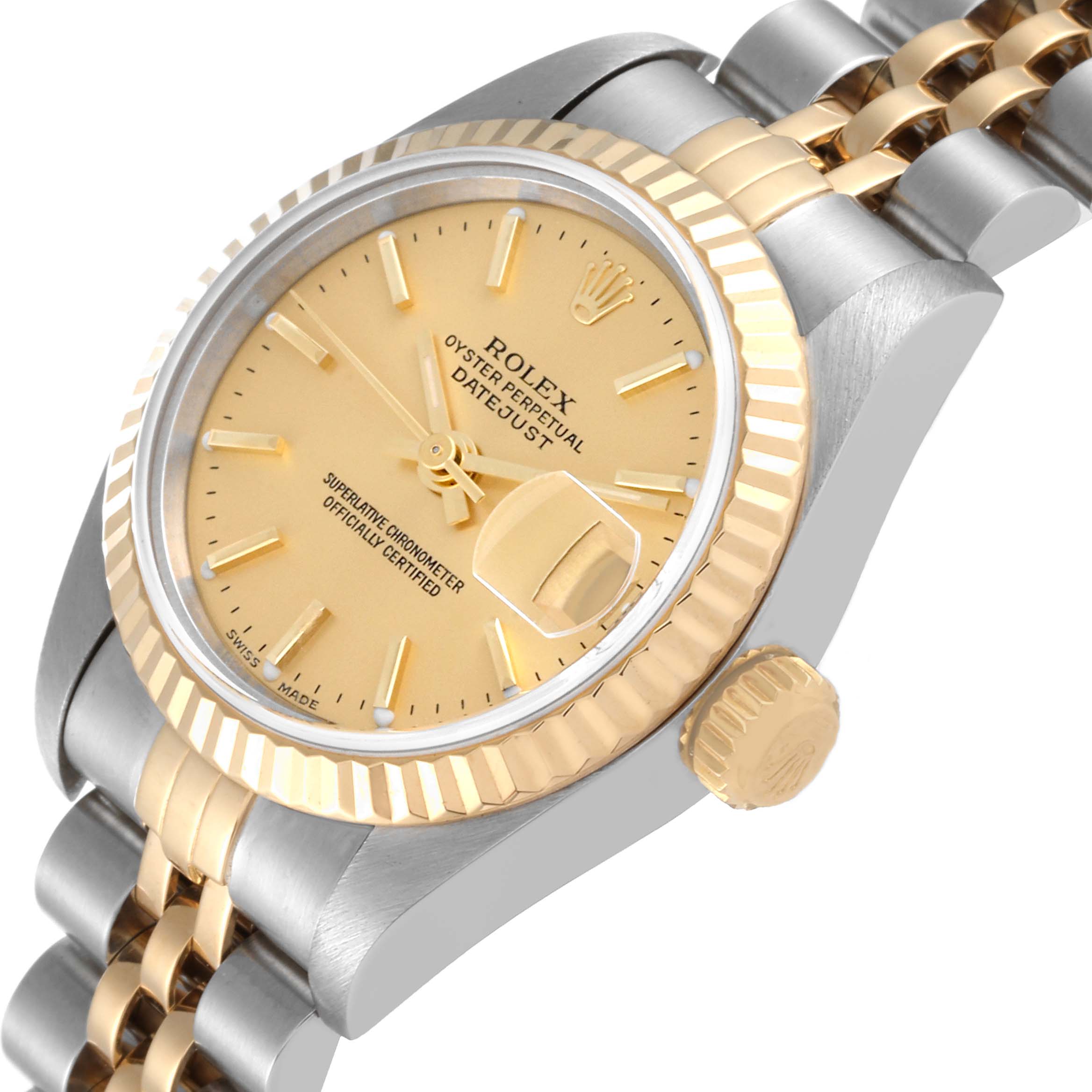 The Rolex Datejust 79173 Women's Steel and Gold (two tone) Champagne Dial 79173 Women's Steel and Gold (two tone) Champagne Dial watch is shown at an oblique angle, highlighting the face, crown, and two-tone band.