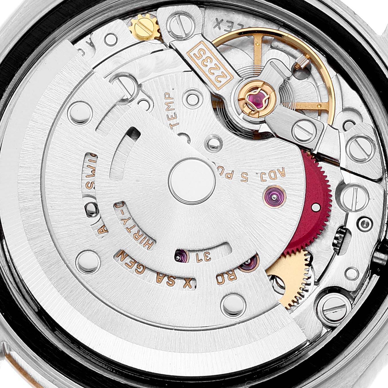 This image shows the intricate internal mechanisms of a Rolex Datejust 79173 Women's Steel and Gold (two tone) Champagne Dial 79173 Women's Steel and Gold (two tone) Champagne Dial watch, focusing on the movement components.