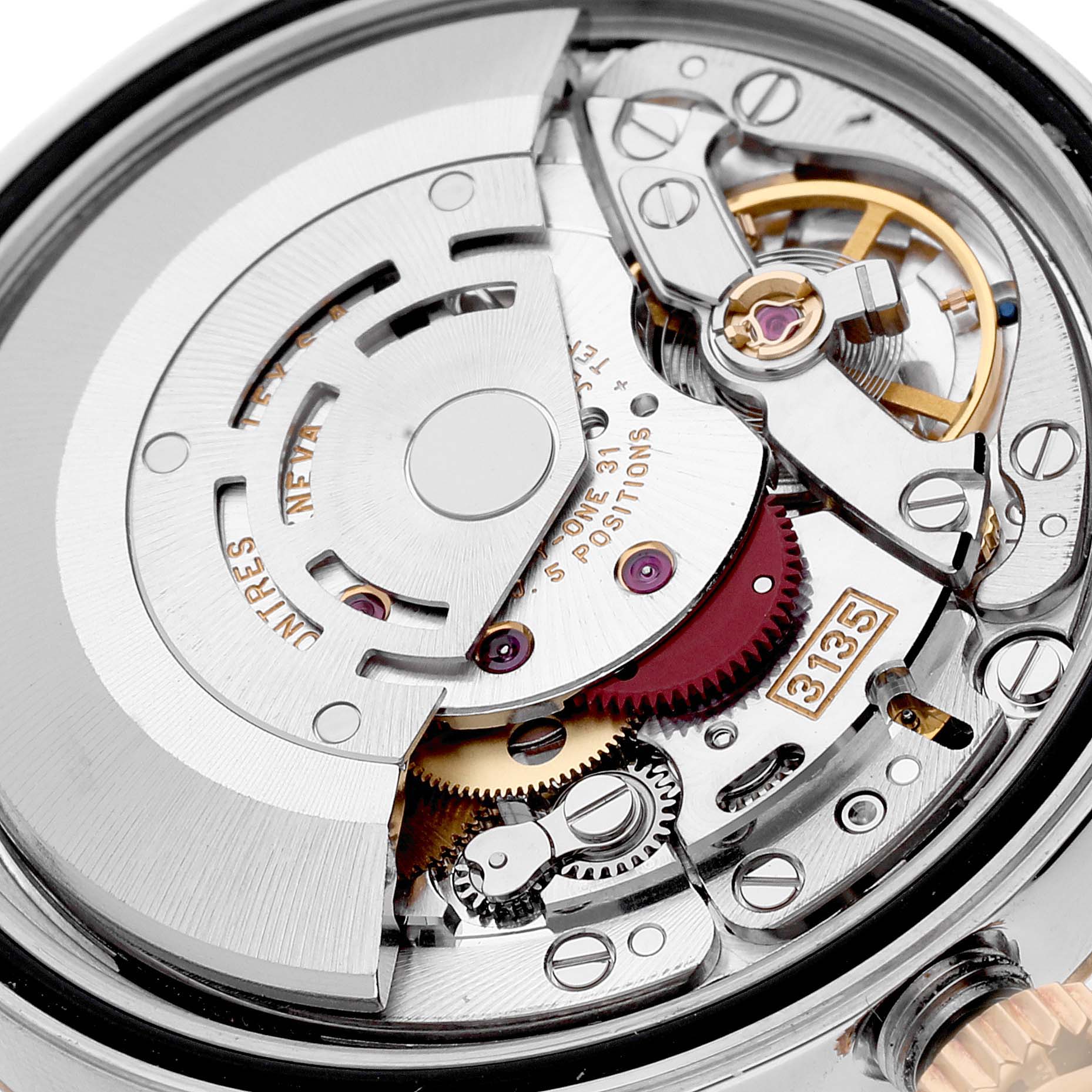 This is an image of the Rolex Datejust 16233 Men's Steel and Gold (two tone) Champagne Dial 16233 Men's Steel and Gold (two tone) Champagne Dial watch's internal movement taken from a close-up, top-down angle.