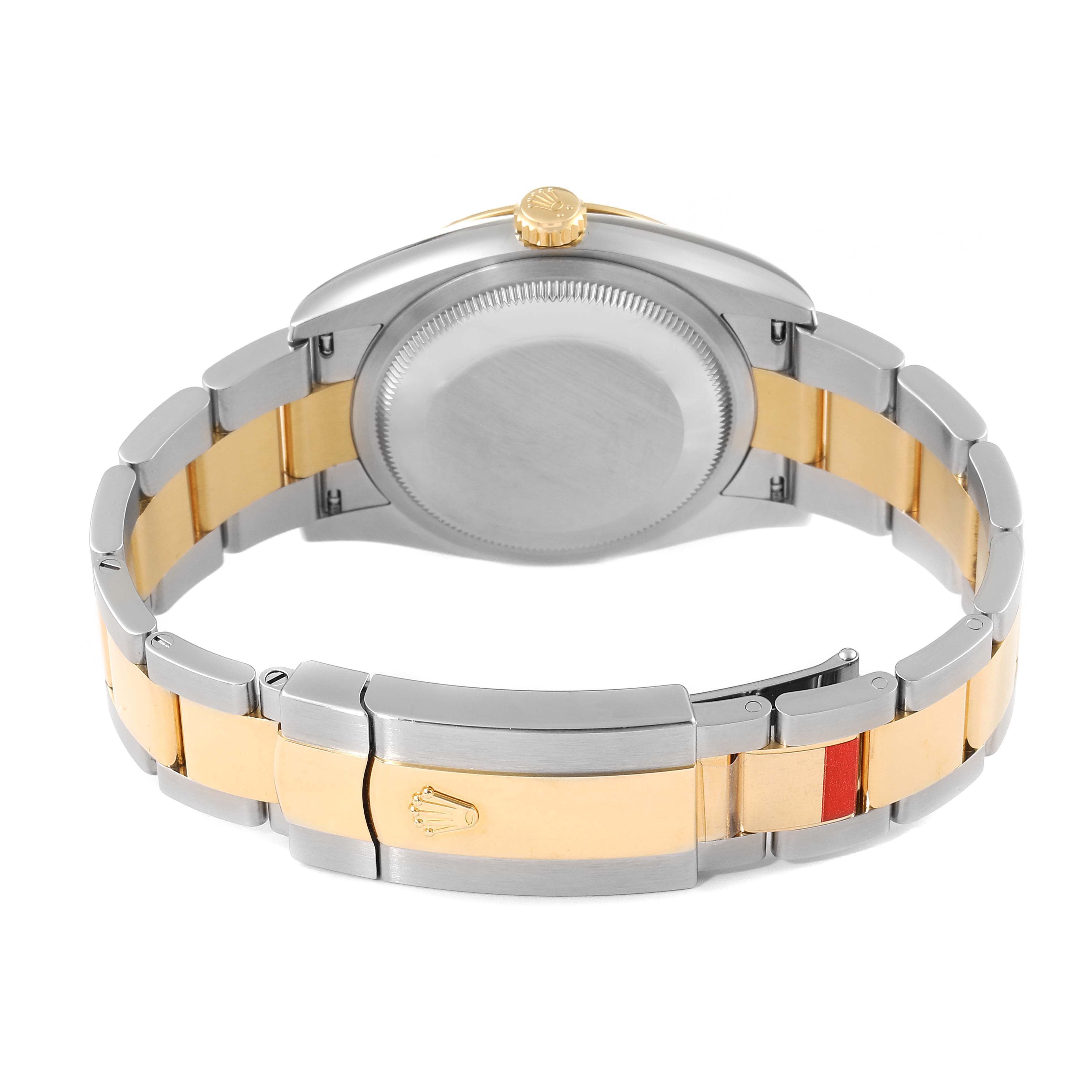 This image shows the back and bracelet of a Rolex Datejust 126233 Men's Steel and Gold (two tone) Green Dial 126233 Men's Steel and Gold (two tone) Green Dial, highlighting its two-tone metal finish and clasp.